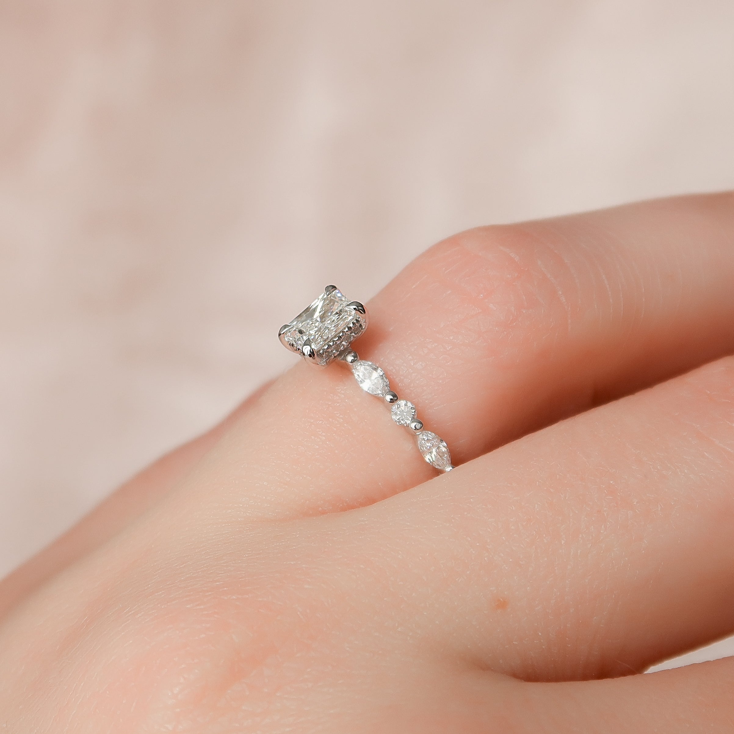 Radiant cut CVD diamond engagement ring with hidden halo and pave setting for a sparkling modern bridal style