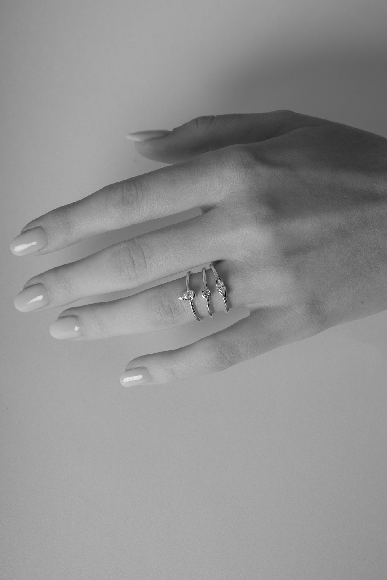 0.15 TCW Marquise Shaped Moissanite Bezel Wedding Band