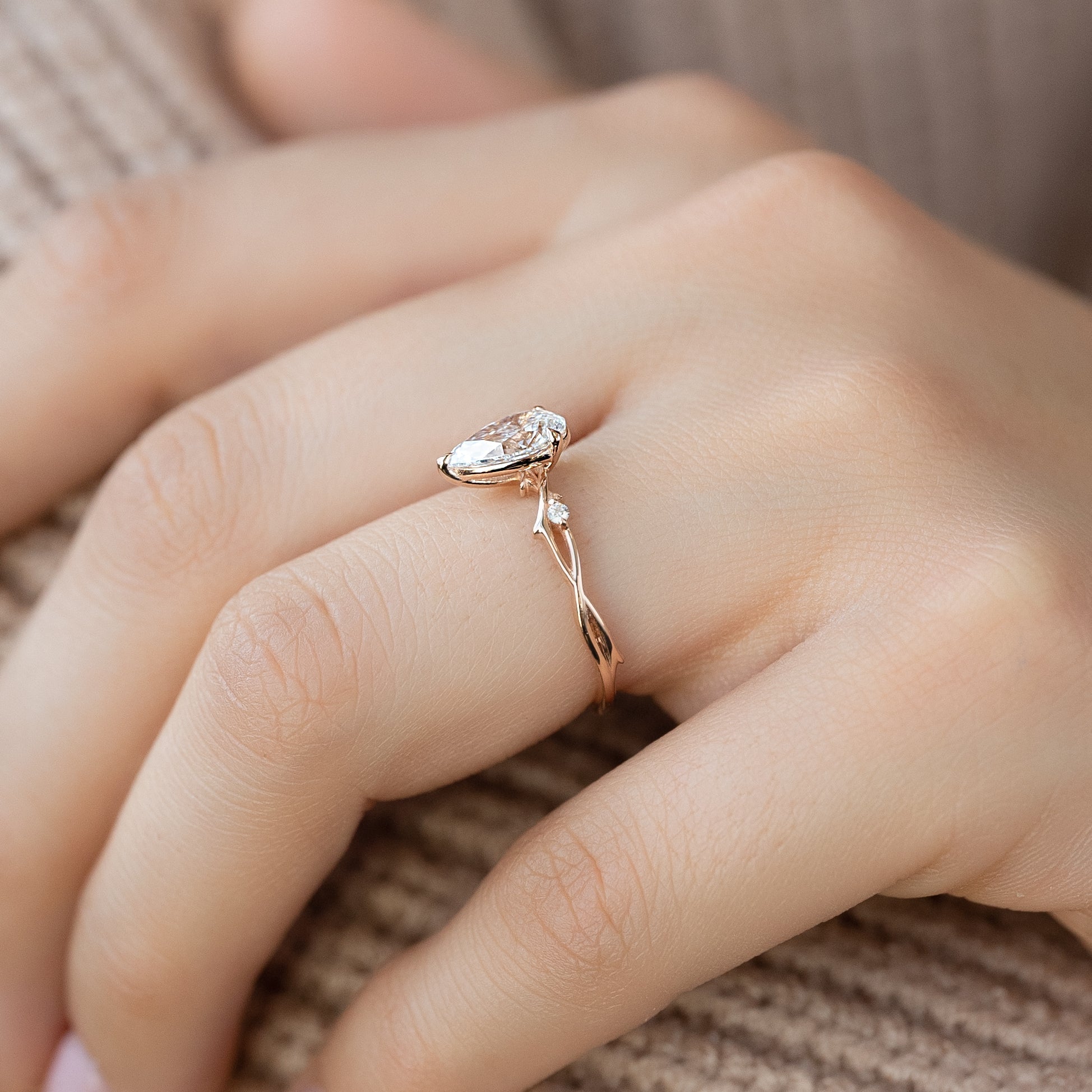 Pear cut CVD diamond engagement ring in twig-style band with organic detailing