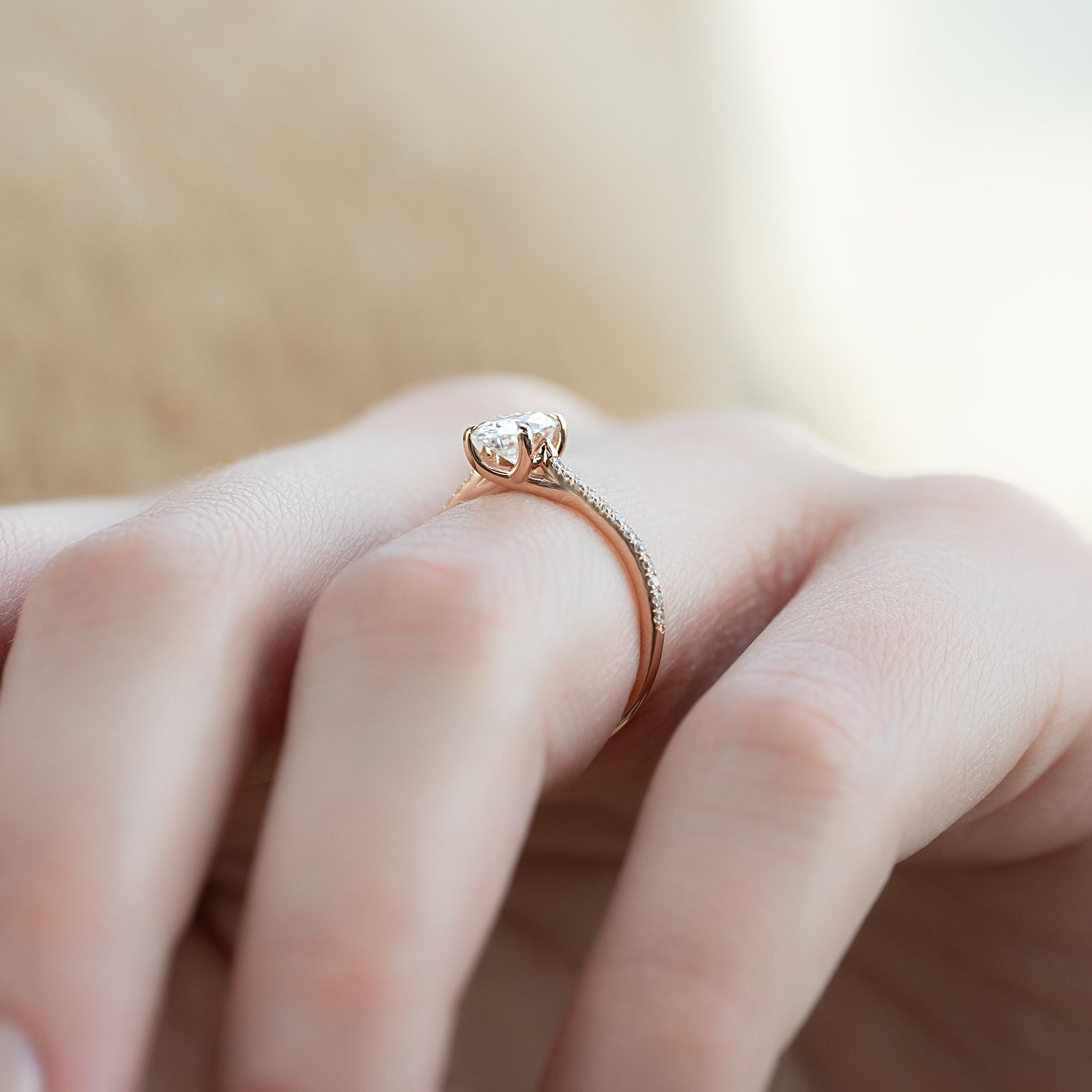 Oval cut CVD diamond engagement ring with pave diamond band in platinum setting