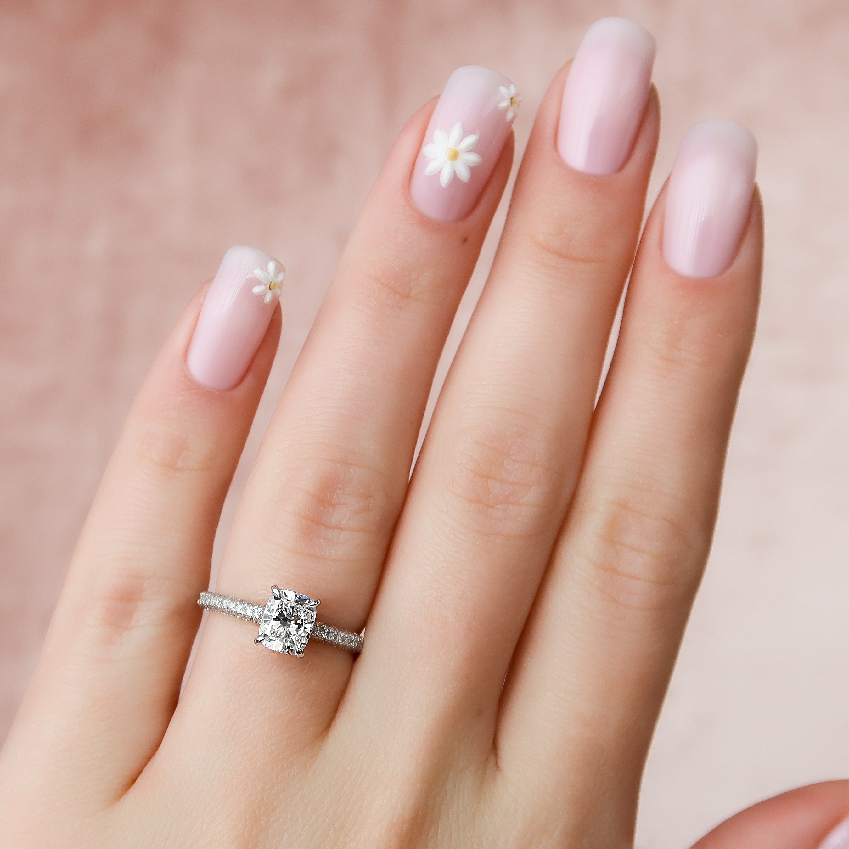 Elongated cushion cut CVD diamond engagement ring with hidden halo and pave diamond band in white gold