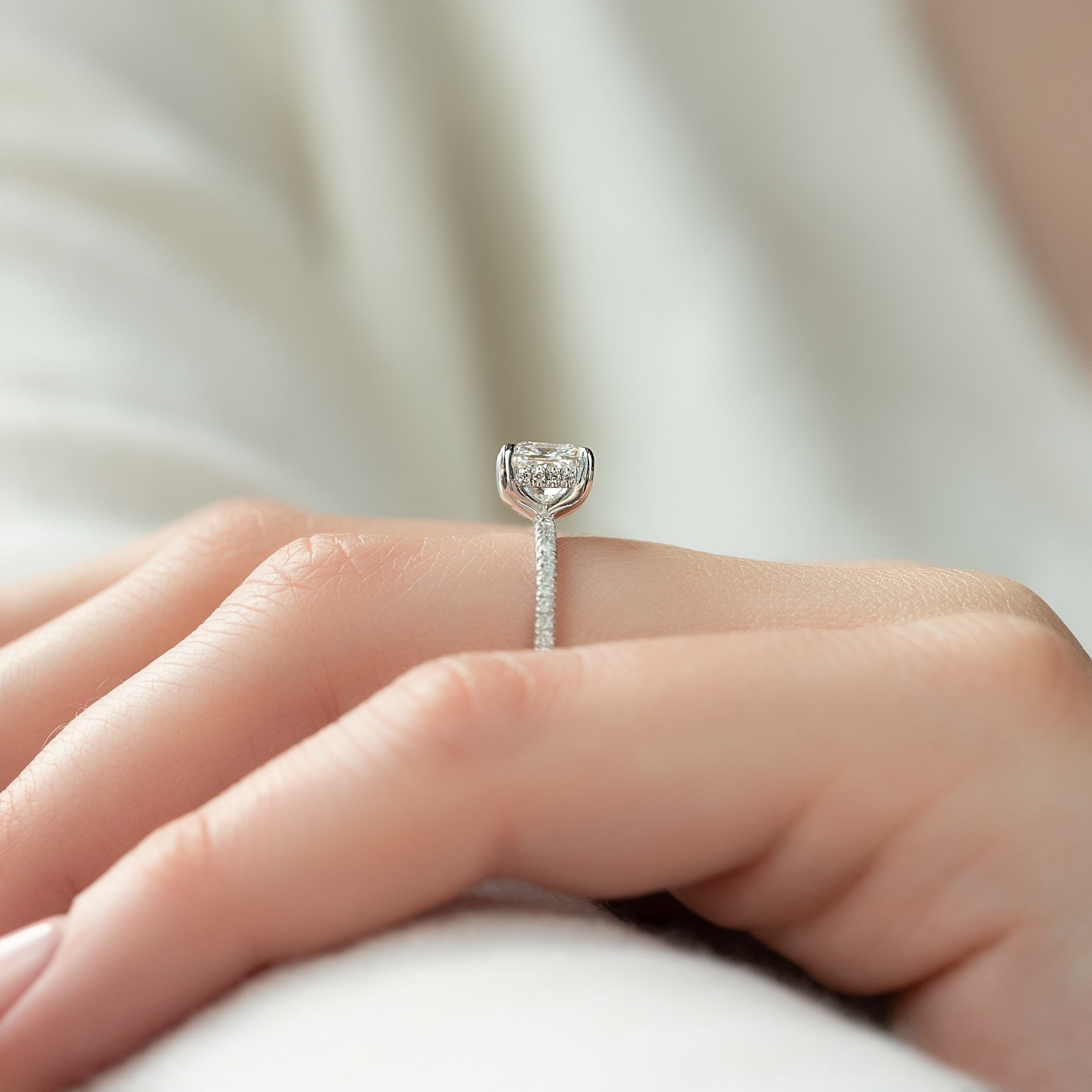 Princess cut CVD diamond engagement ring with hidden halo and pave diamond band in white gold