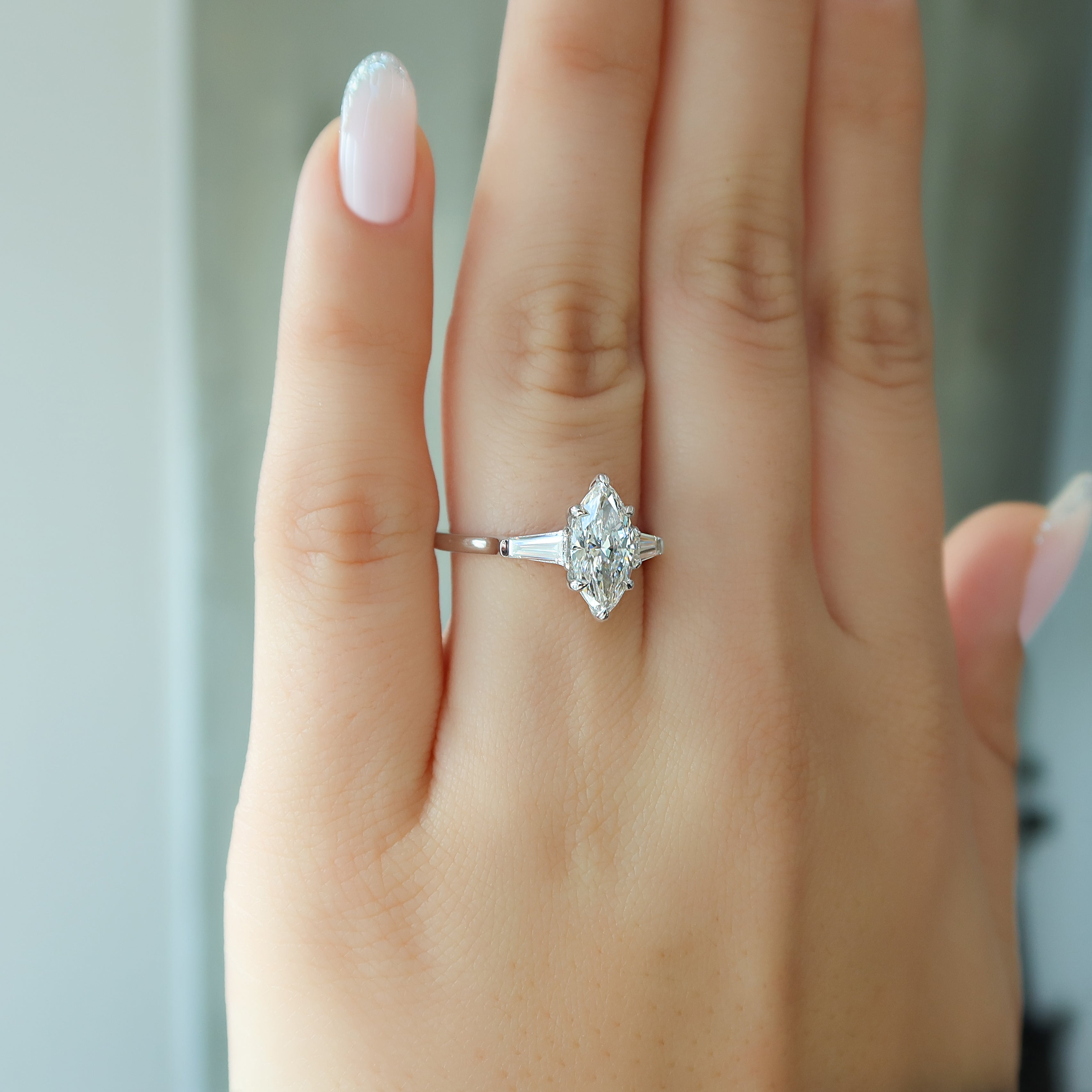 Marquise cut CVD diamond three stone engagement ring in white gold setting