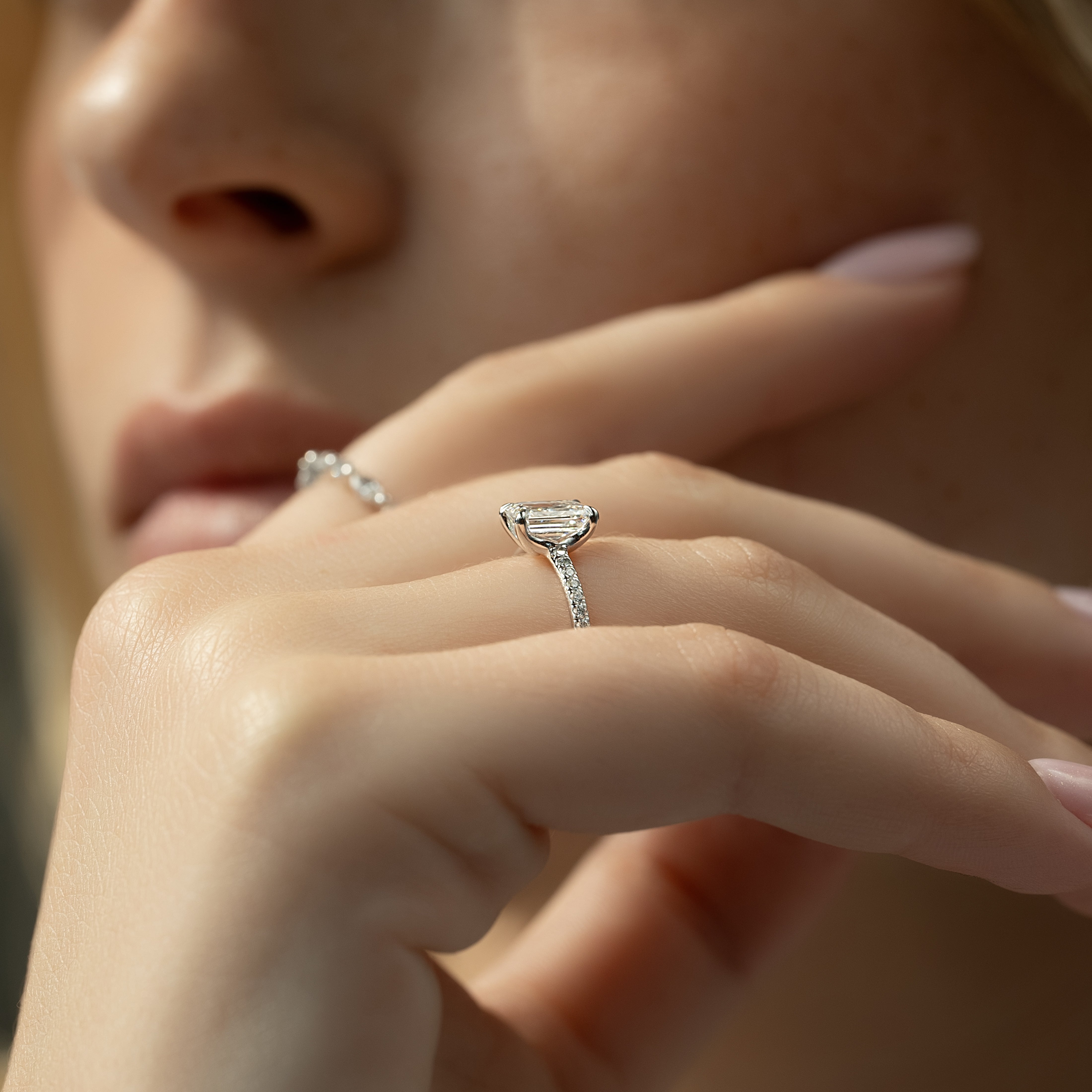 Emerald cut CVD diamond pave setting engagement ring in white gold