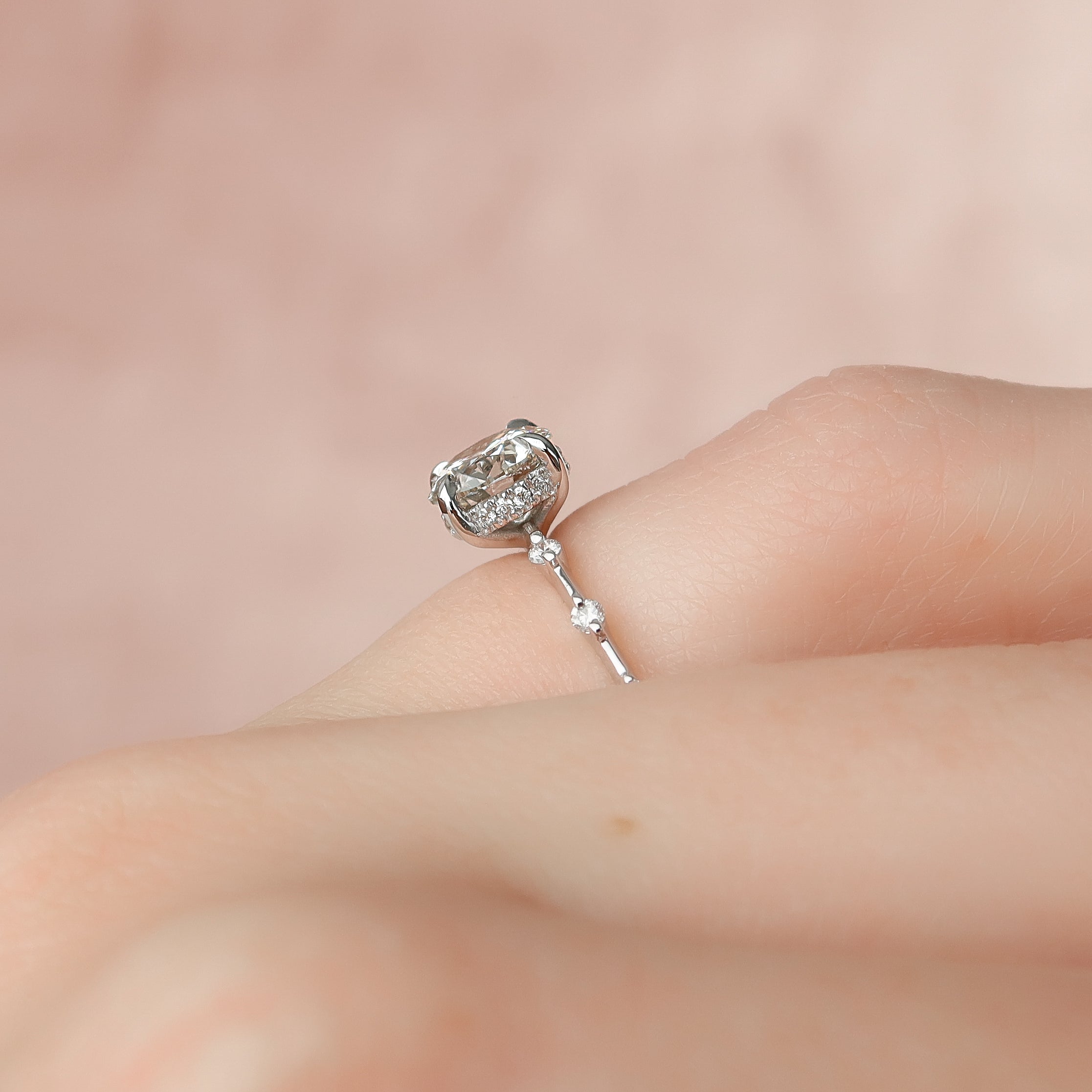 Round cut CVD diamond engagement ring with hidden halo and pave band in white gold