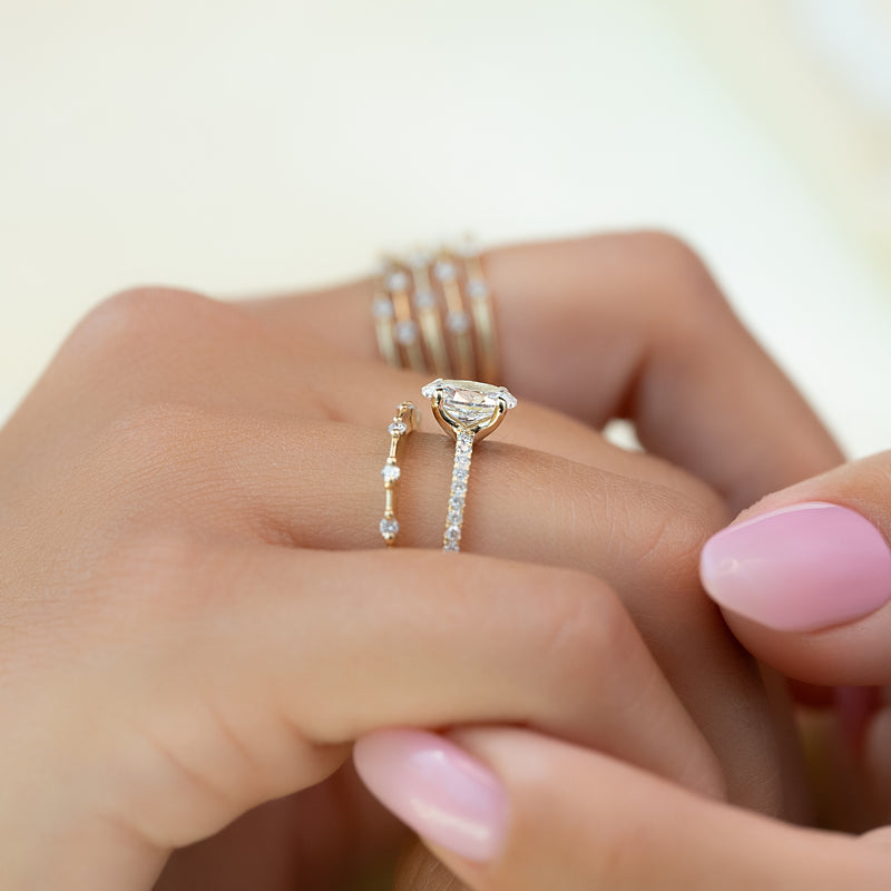 Oval cut CVD diamond pave engagement ring with slim diamond band in white gold