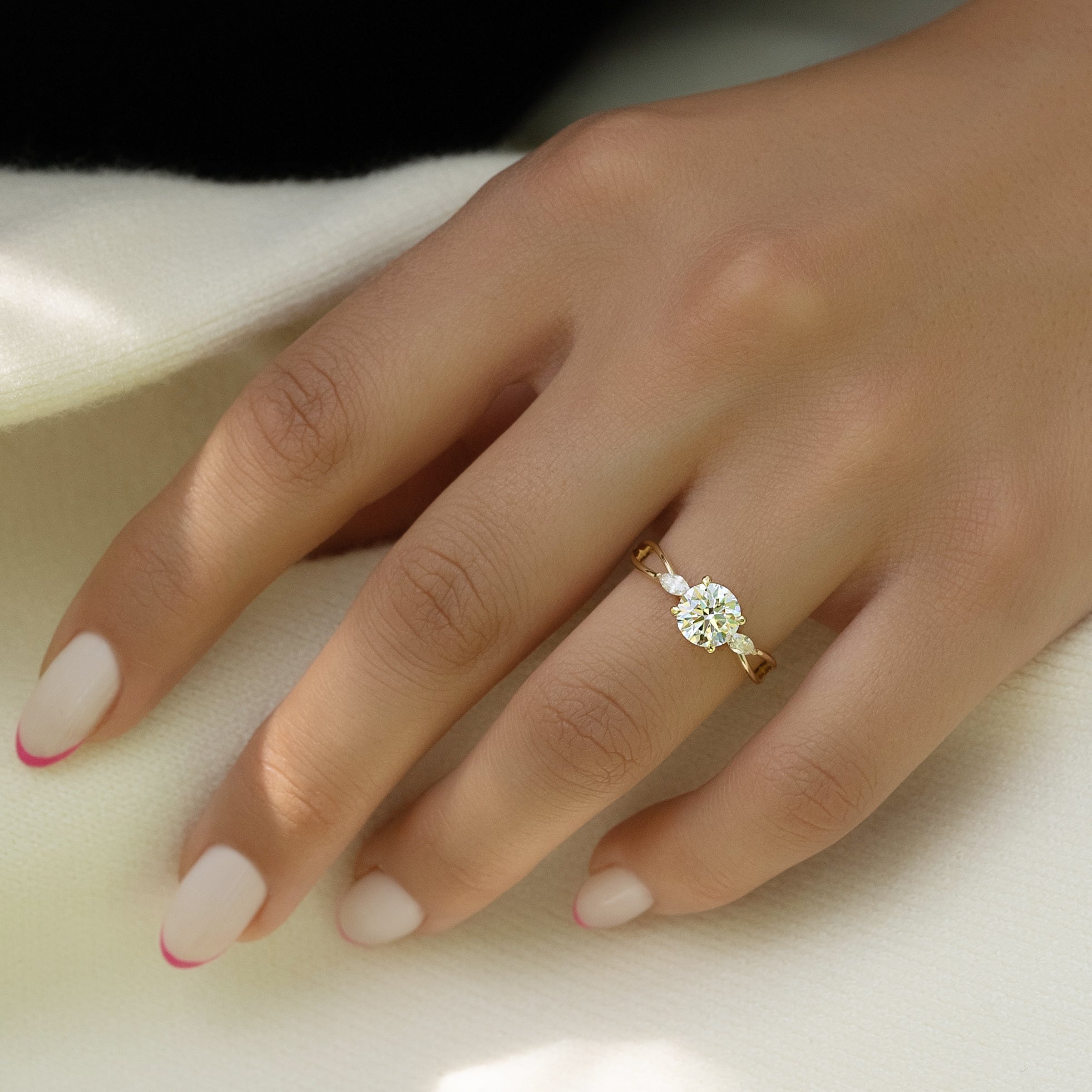 Round cut CVD diamond three stone engagement ring in white gold setting