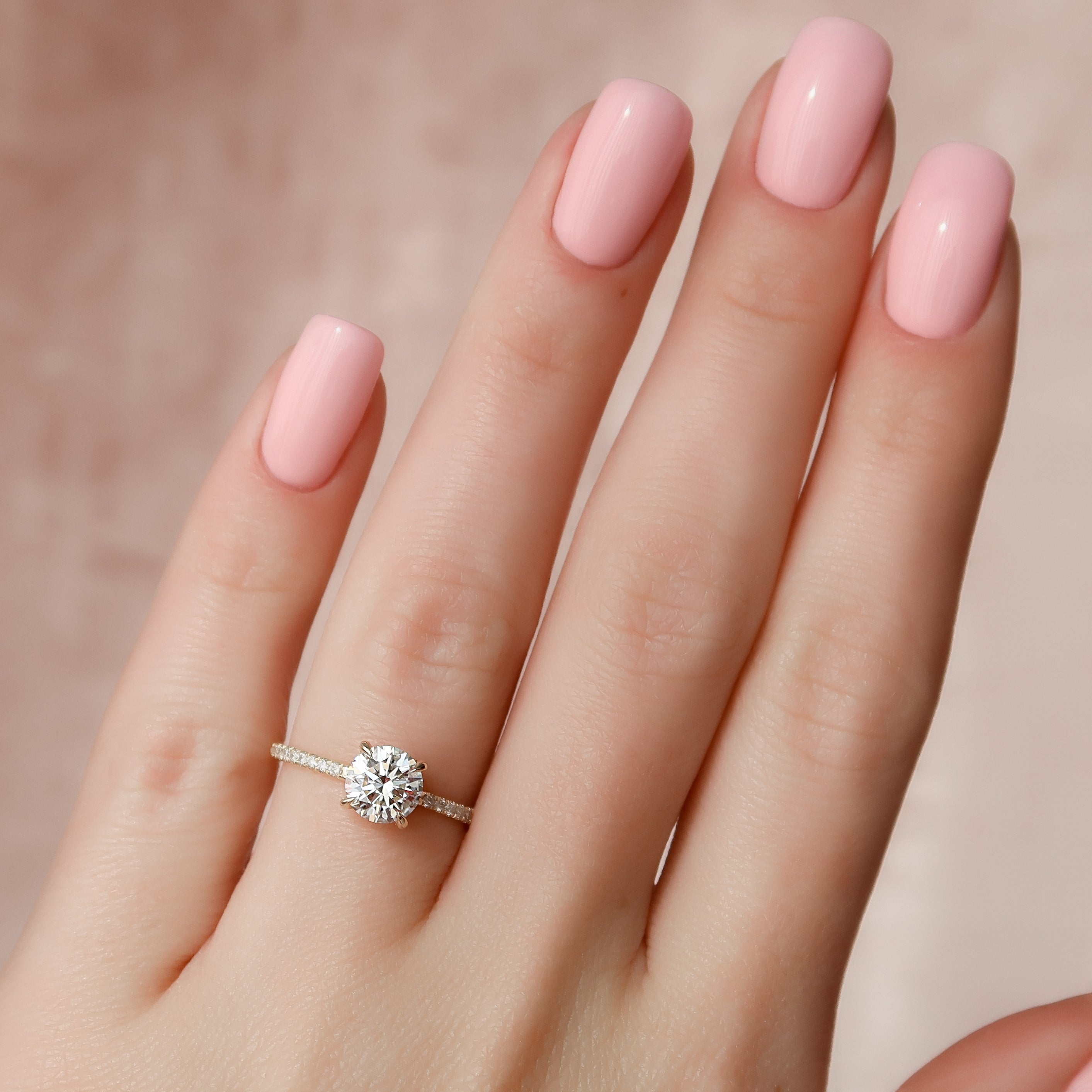 Round cut CVD diamond engagement ring with hidden halo and pave diamond band in white gold