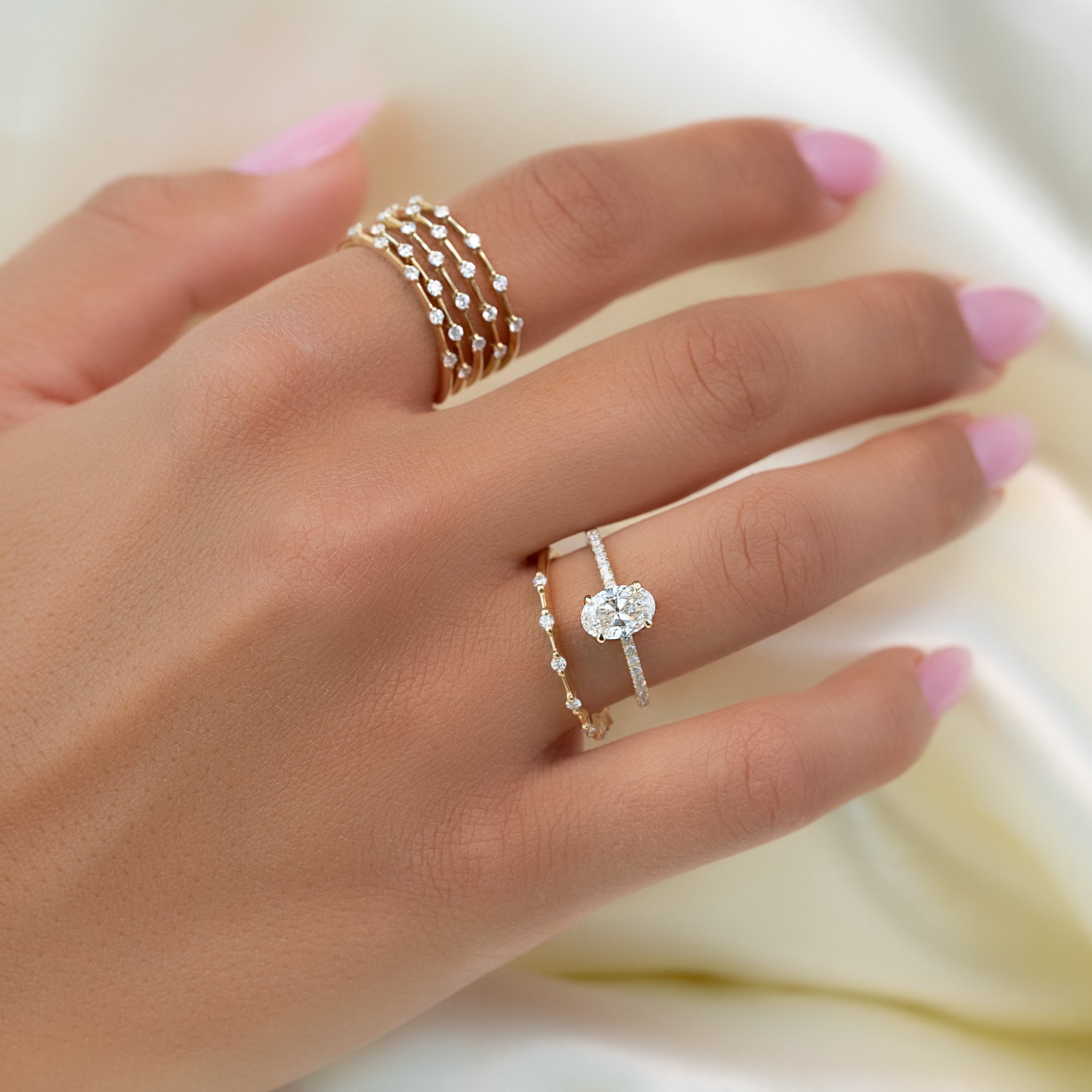 Oval cut CVD diamond pave engagement ring with slim diamond band in white gold