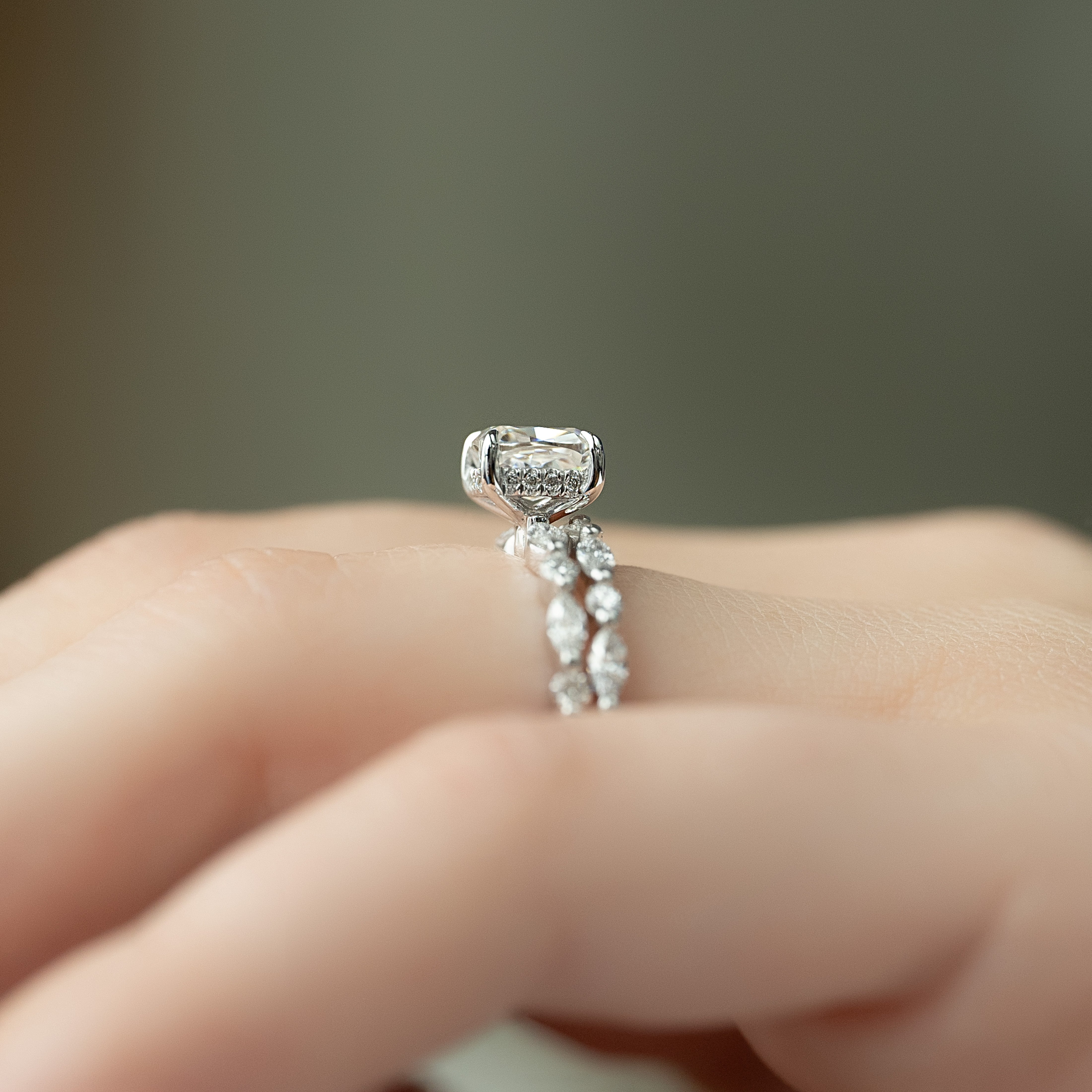 Elongated cushion cut CVD diamond hidden halo engagement ring with pave band in white gold