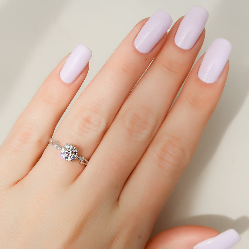 Round cut CVD diamond engagement ring with twig-inspired band in white gold