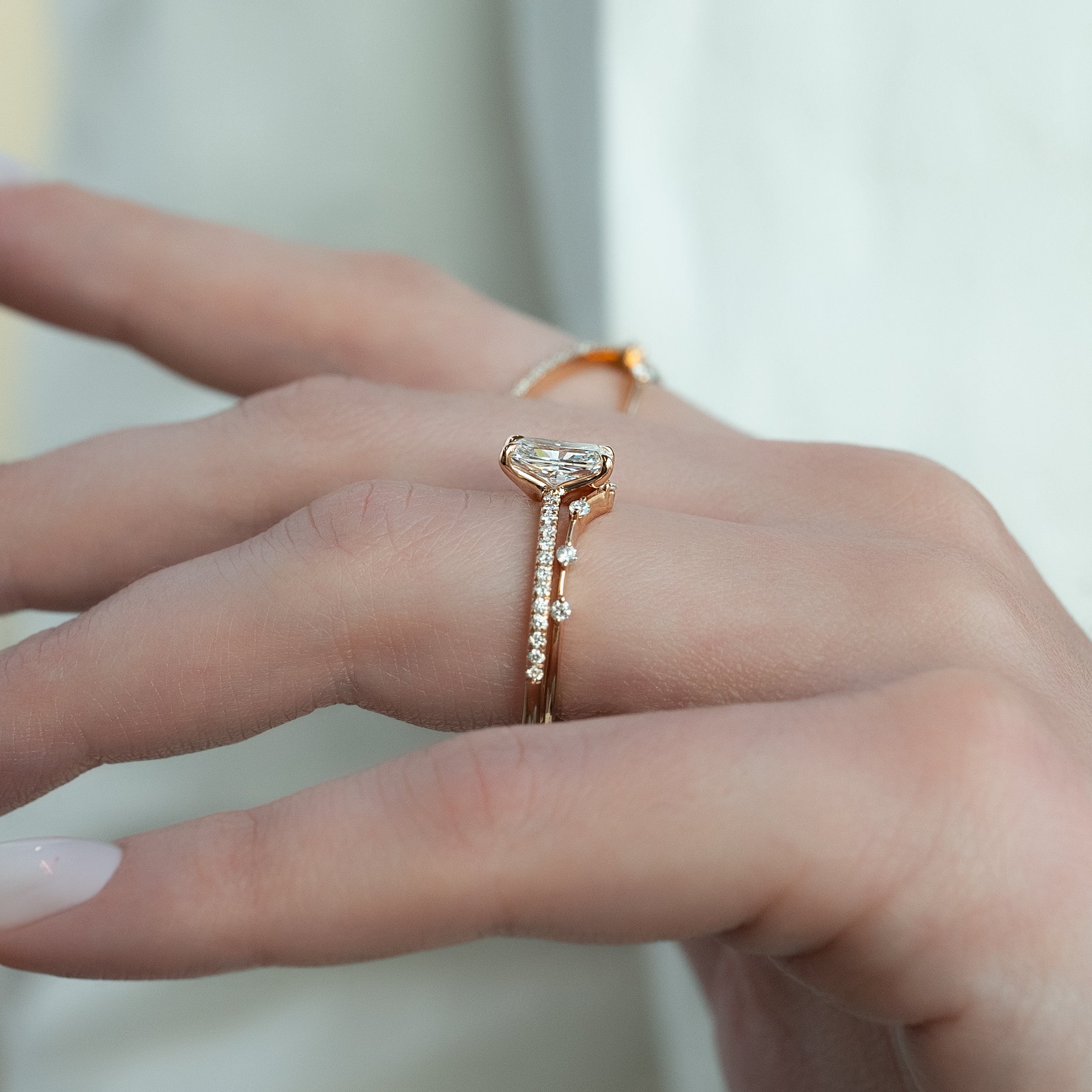 Radiant cut CVD diamond engagement ring with pave diamond band in platinum setting