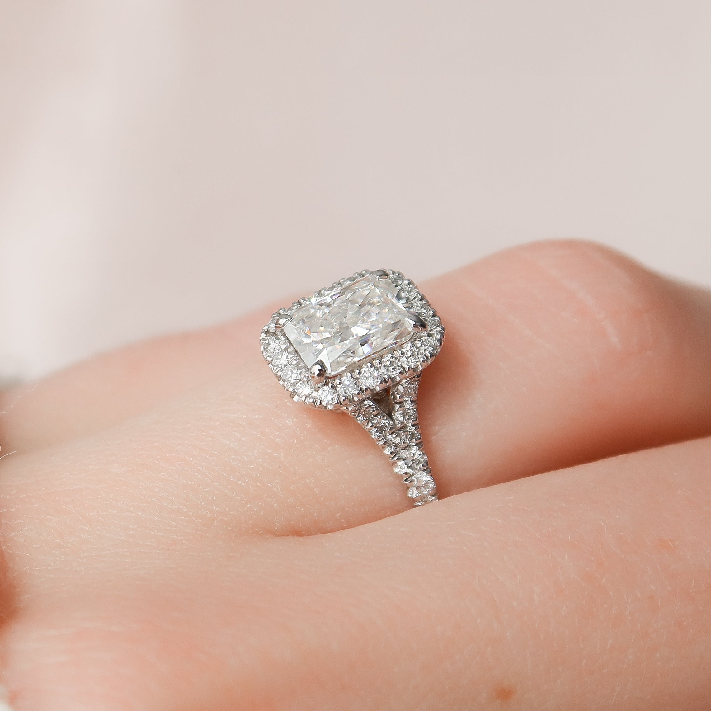 Radiant cut CVD diamond engagement ring with halo and split shank band, elegant bridal jewelry design