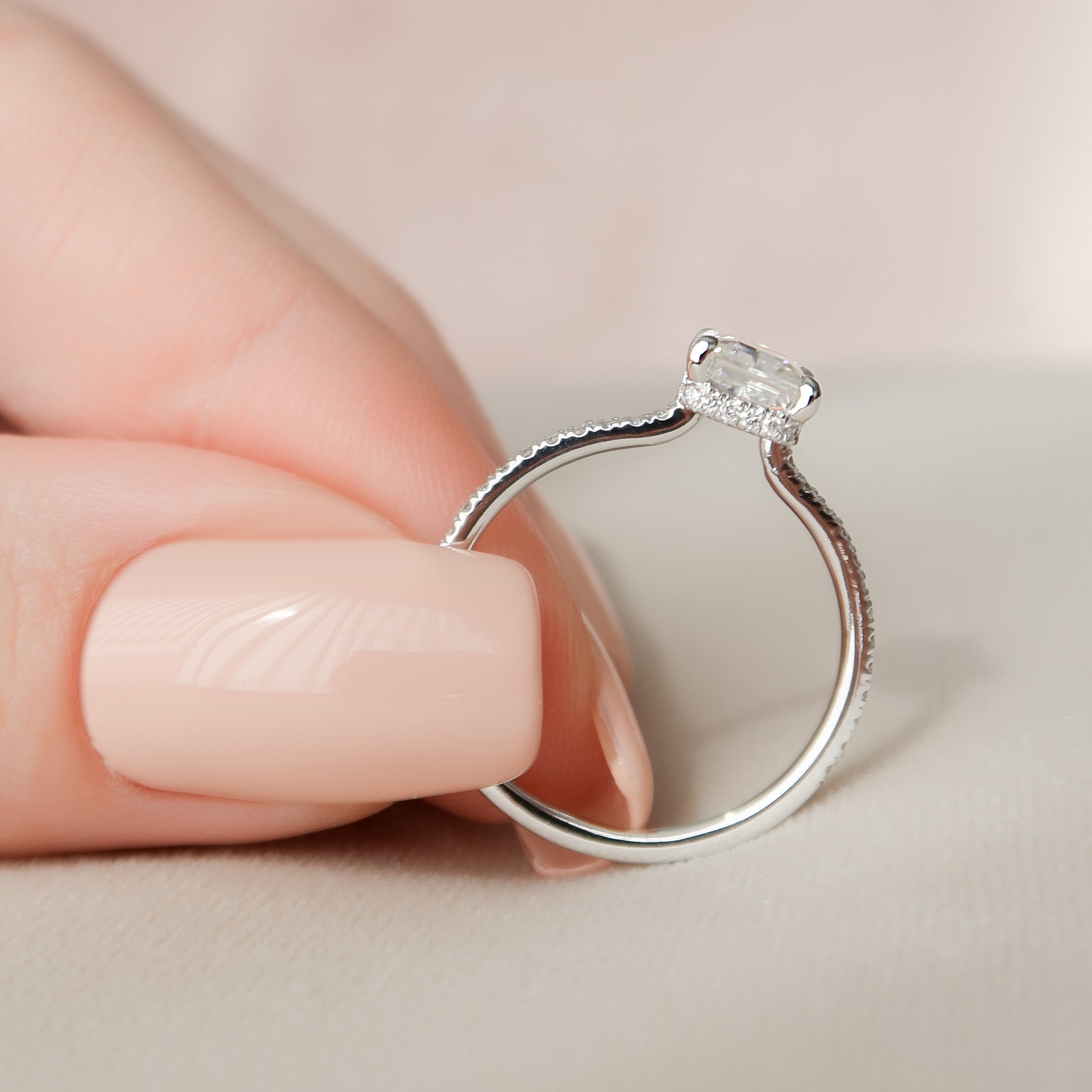 Radiant cut CVD diamond engagement ring with hidden halo and pave diamond band in platinum setting