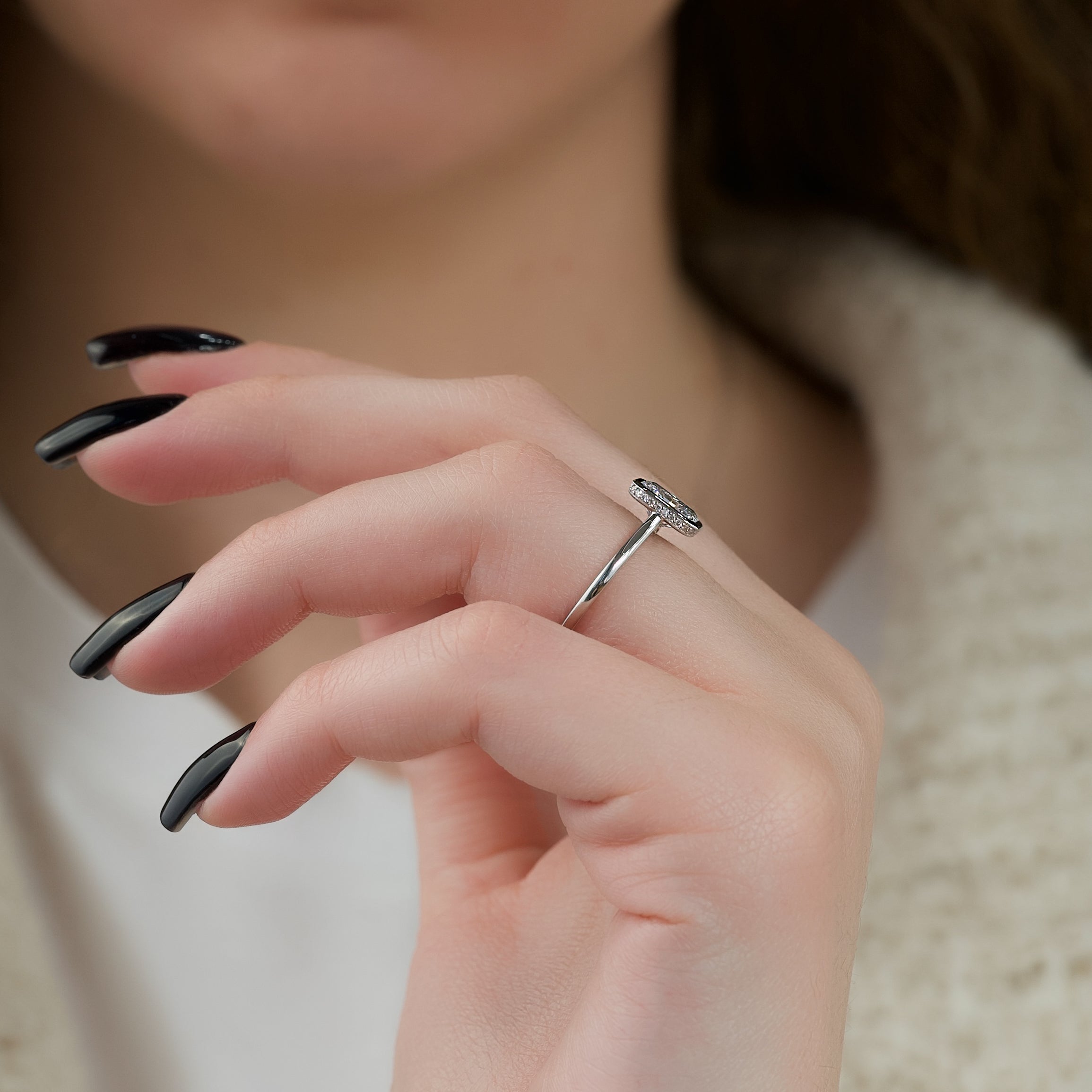 Radiant cut CVD diamond bezel set engagement ring with hidden halo in platinum setting