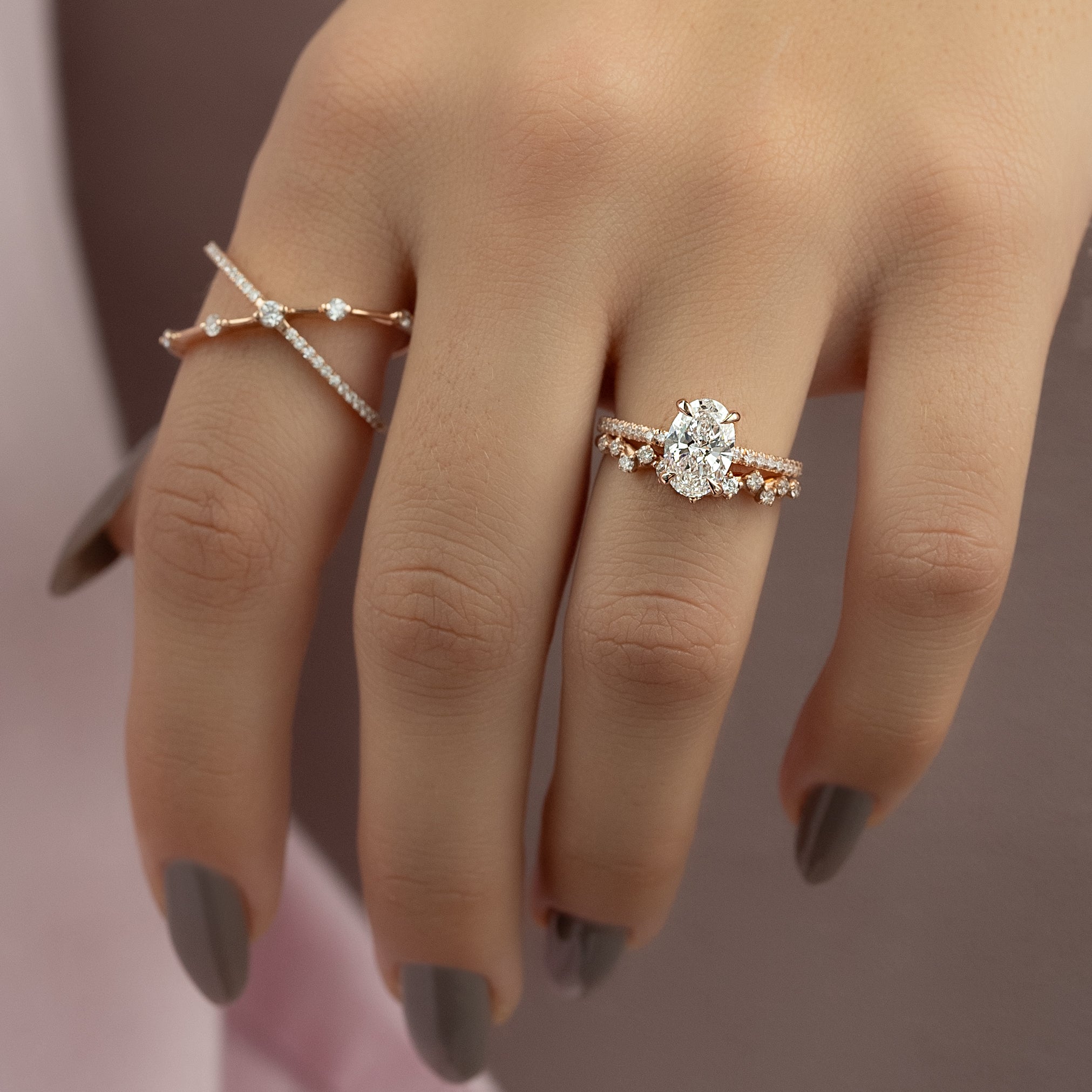 Oval cut CVD diamond engagement ring featuring hidden halo and pave band in platinum