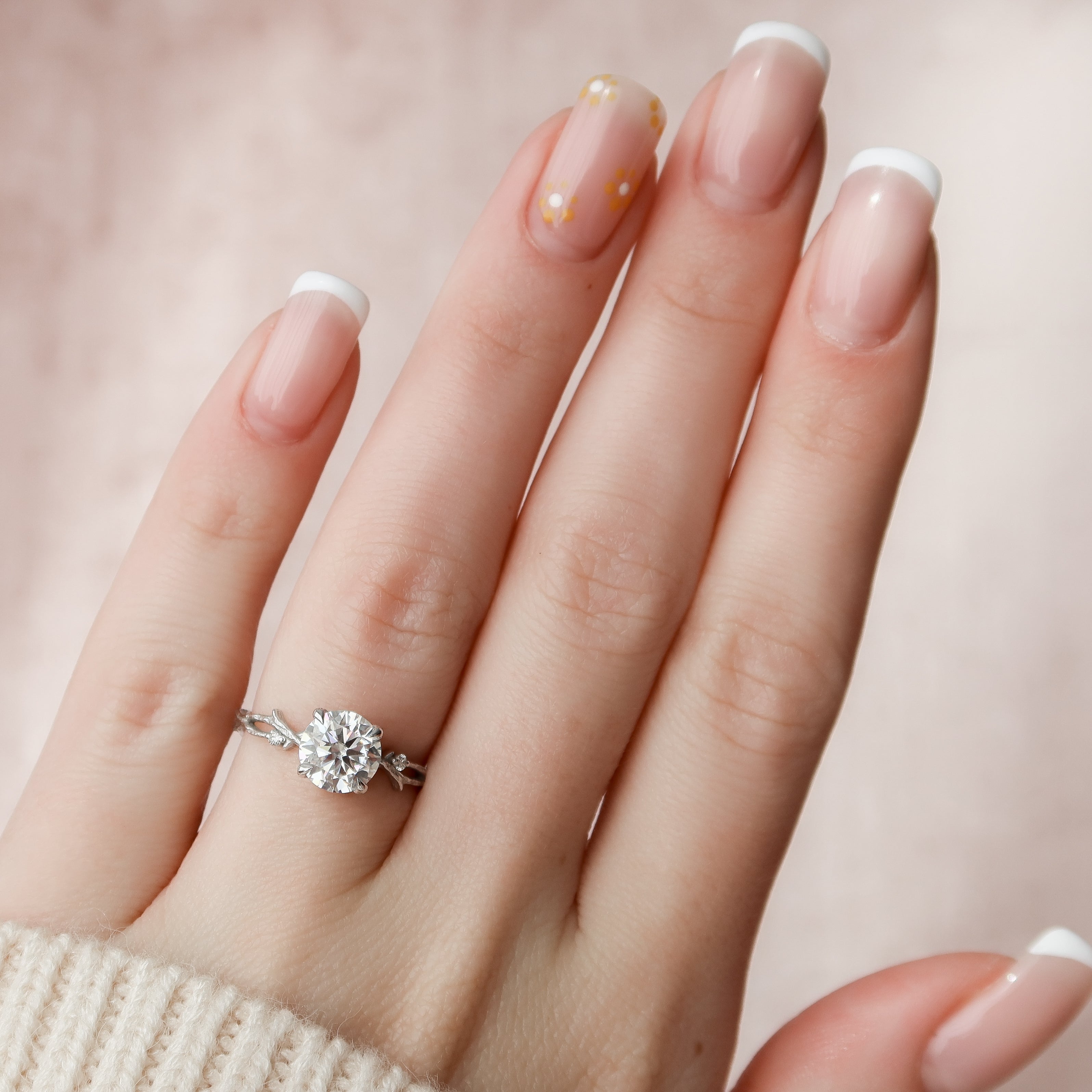 Round cut CVD diamond engagement ring with twig-inspired band in white gold