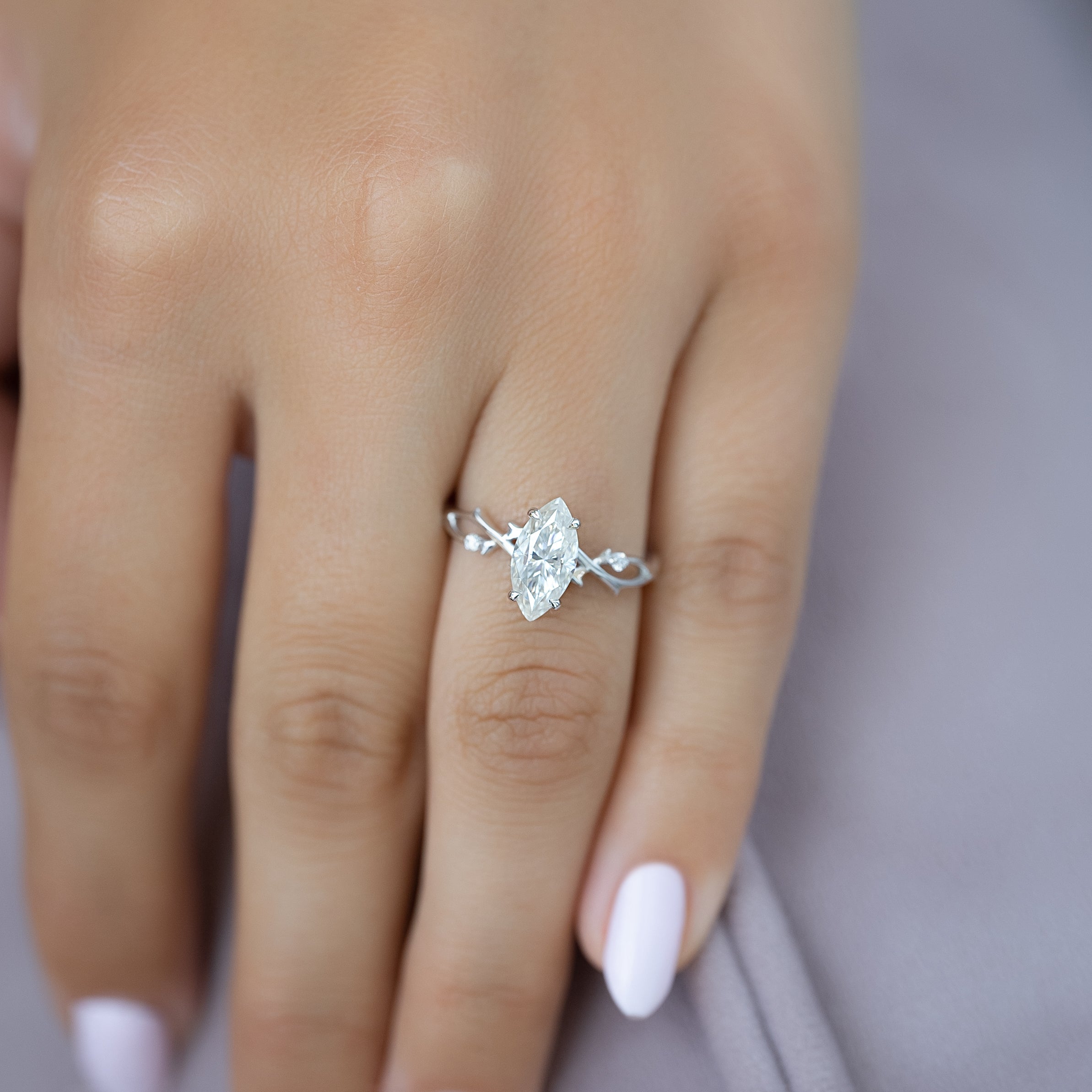 Marquise cut CVD diamond engagement ring with twig-style band in white gold