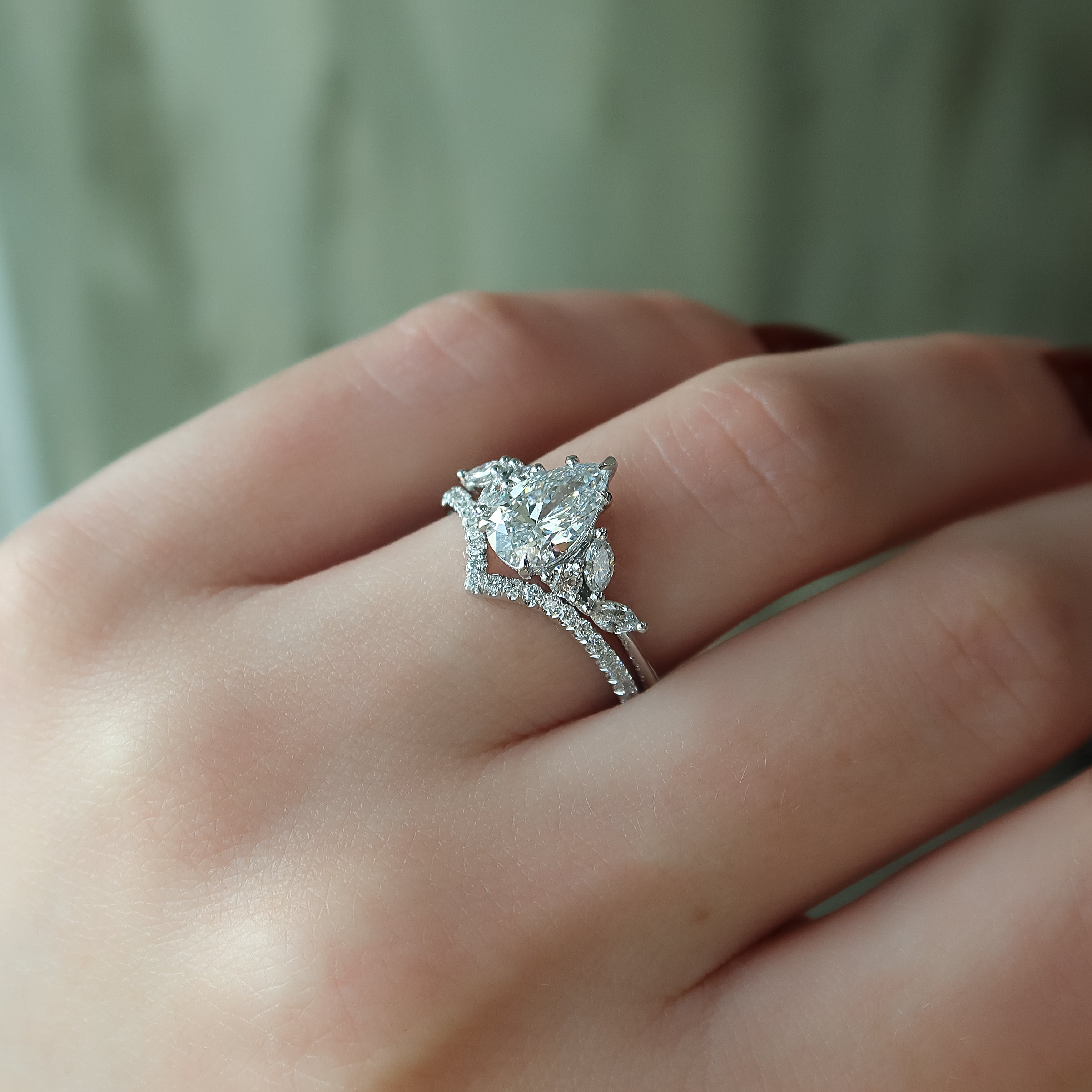 Pear cut CVD diamond cluster engagement ring in platinum setting
