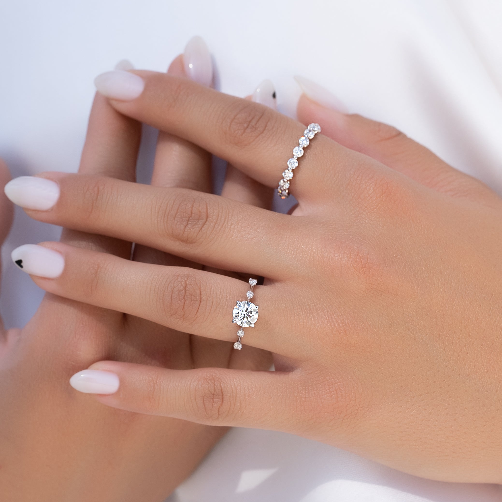 Round cut CVD diamond dainty engagement ring in white gold setting