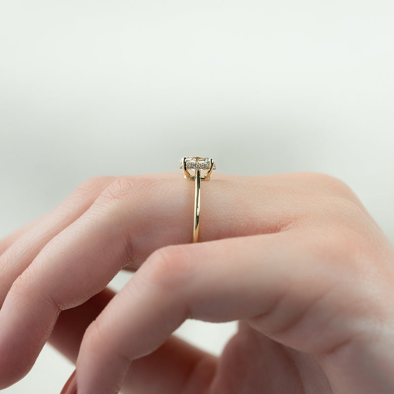 Oval cut CVD diamond engagement ring with hidden halo in white gold setting