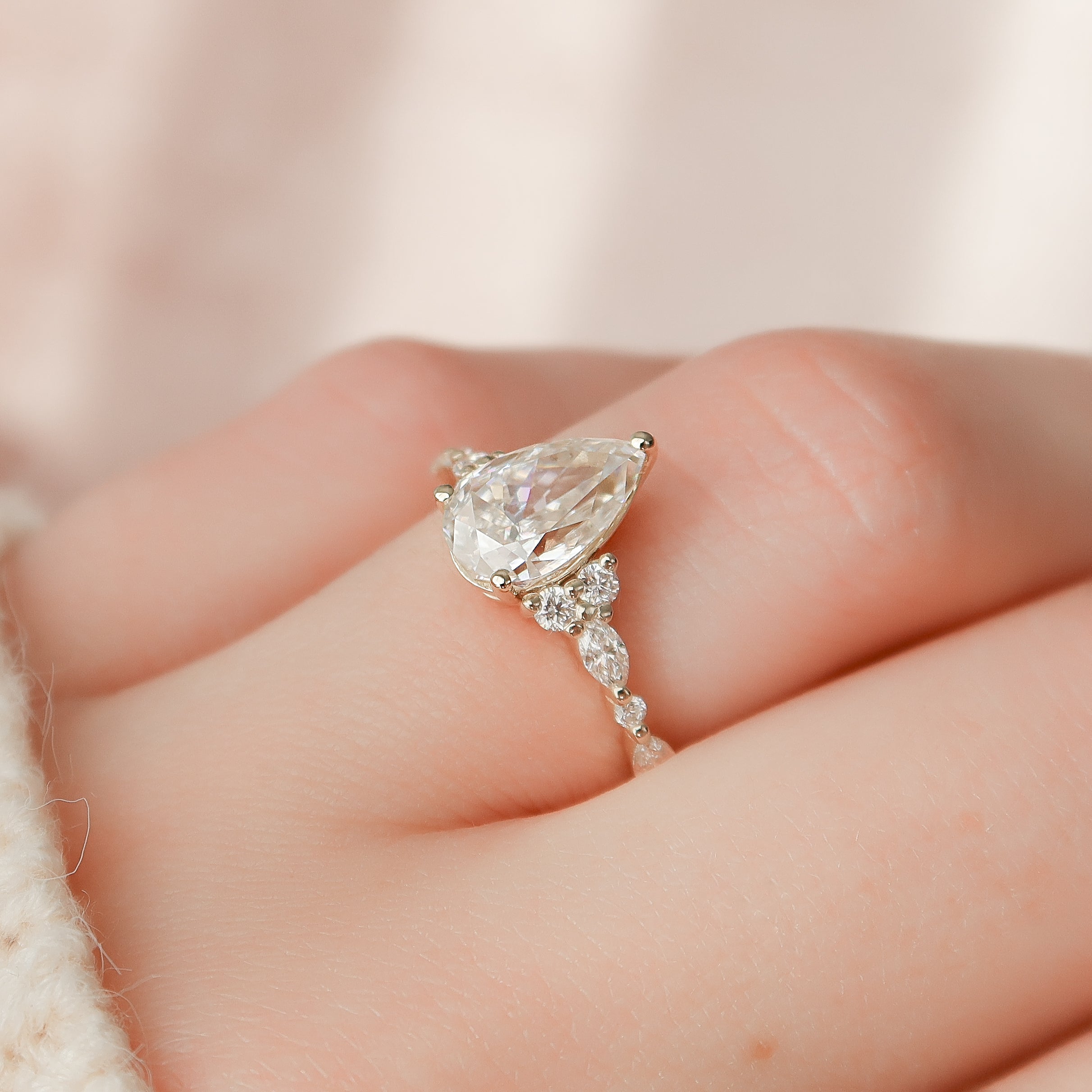 Pear cut CVD diamond cluster engagement ring in white gold setting
