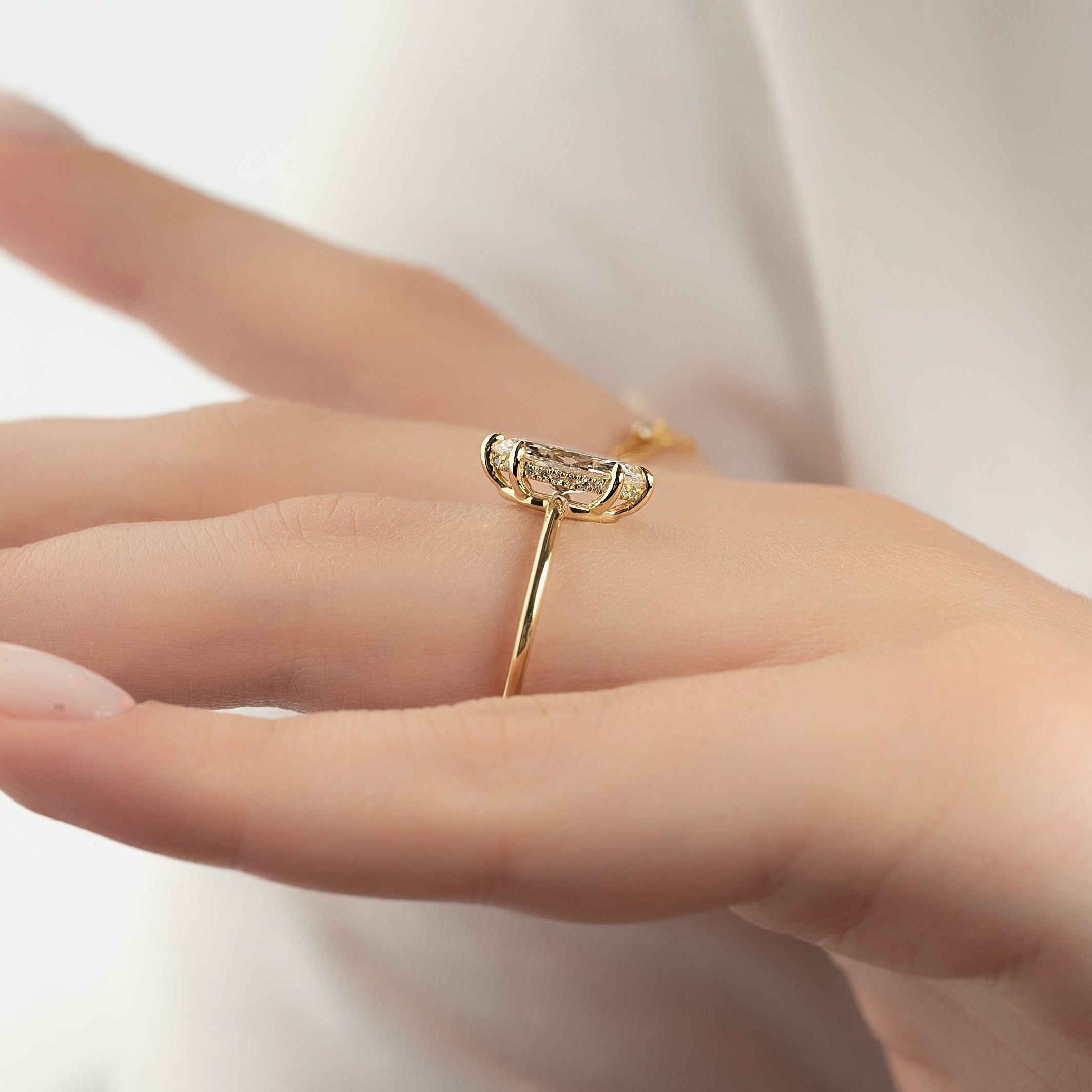 Marquise cut moissanite engagement ring with hidden halo in platinum setting, 2.0-4.0 CT