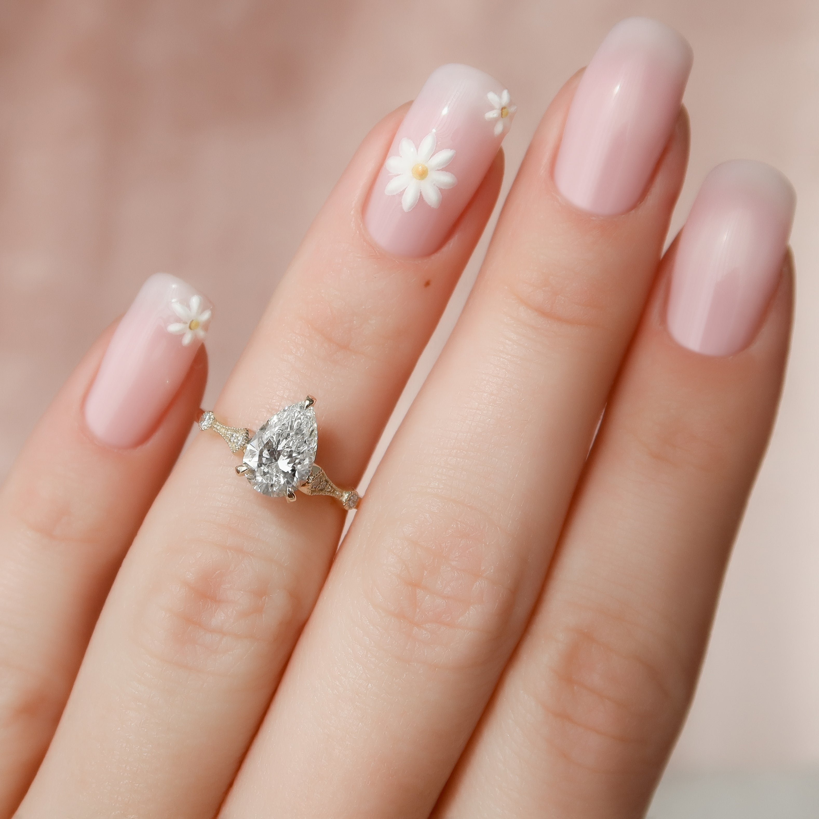 Pear cut CVD diamond vintage style engagement ring with intricate detailing