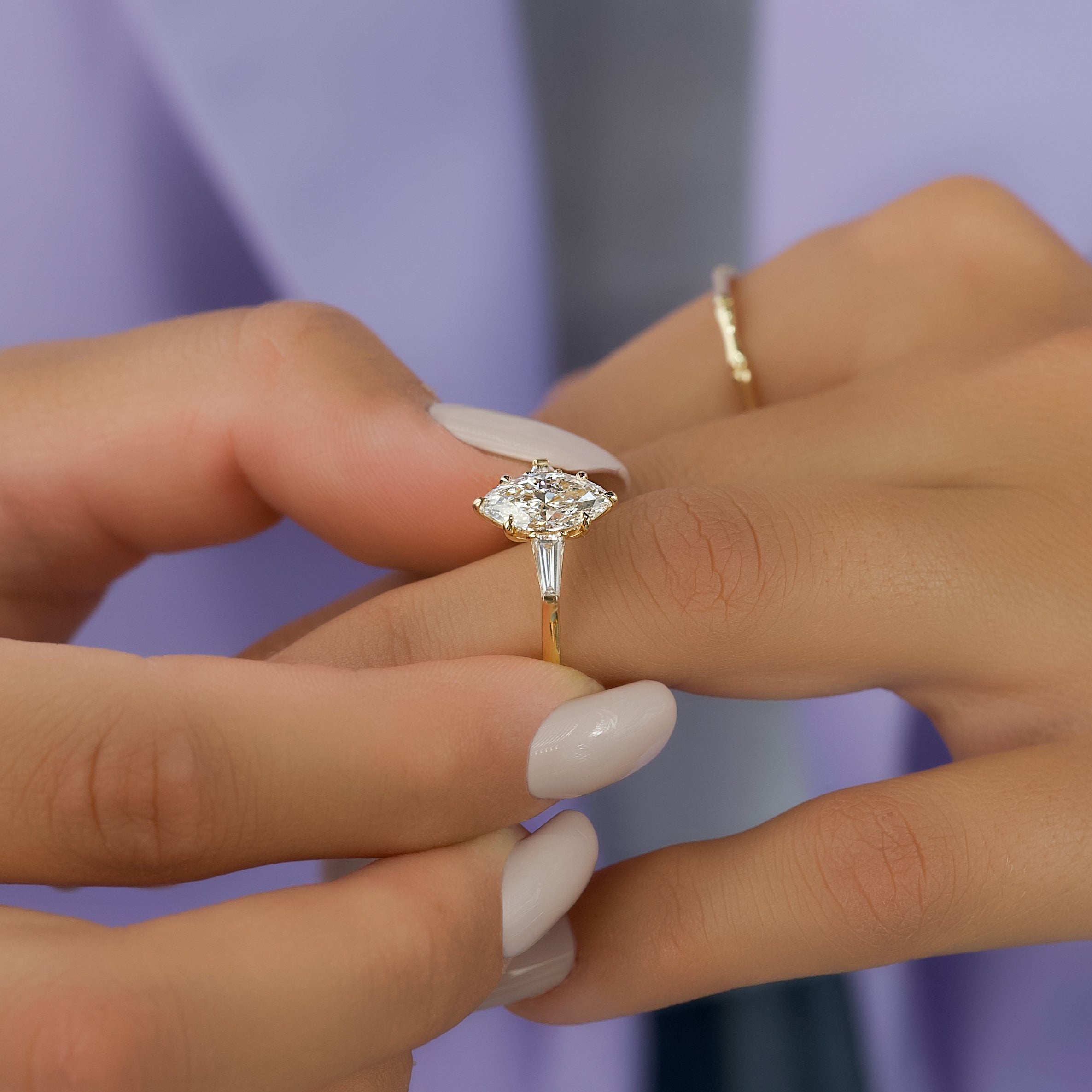 Marquise cut CVD diamond three stone engagement ring in white gold setting