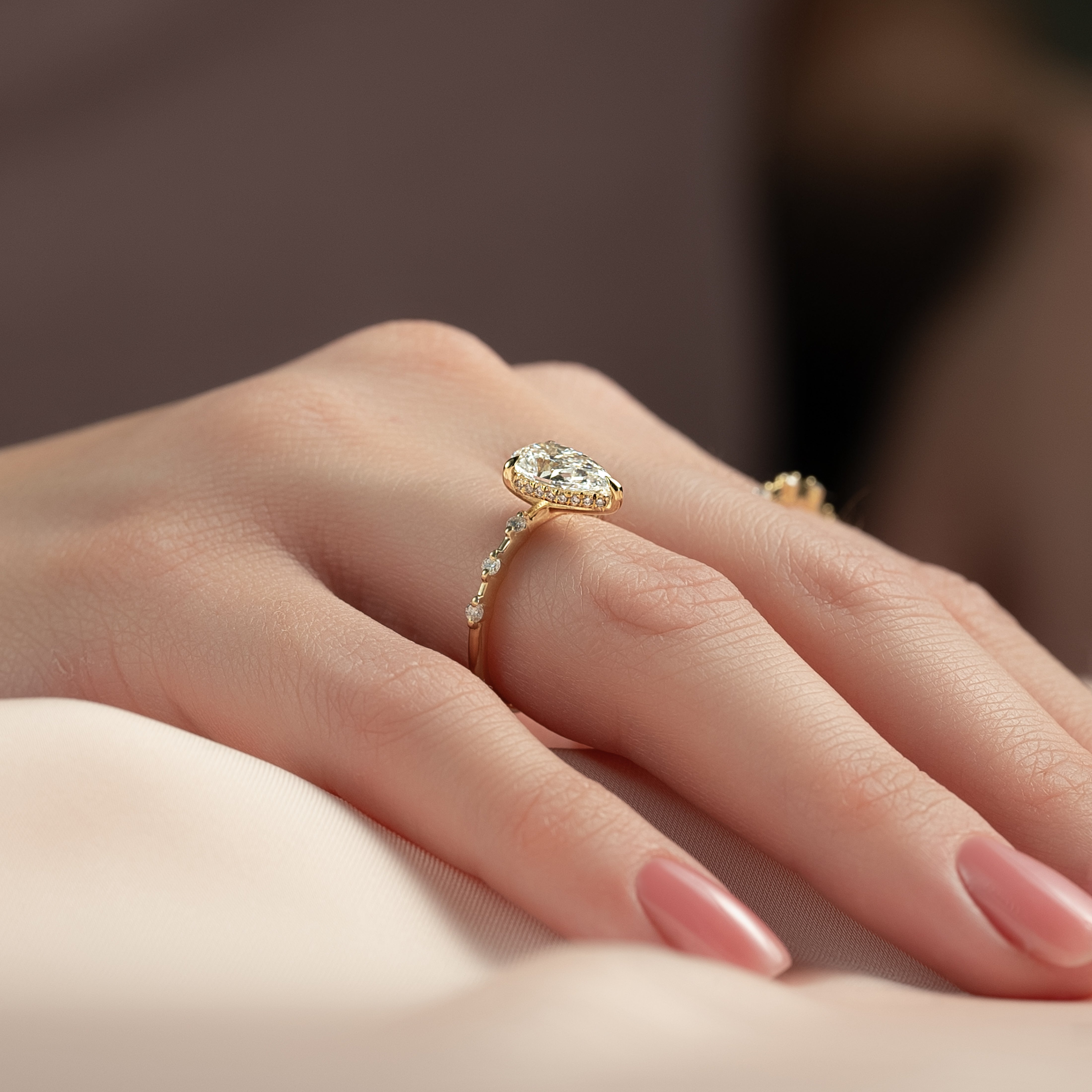 Pear cut CVD diamond engagement ring with hidden halo and dainty pave band in white gold
