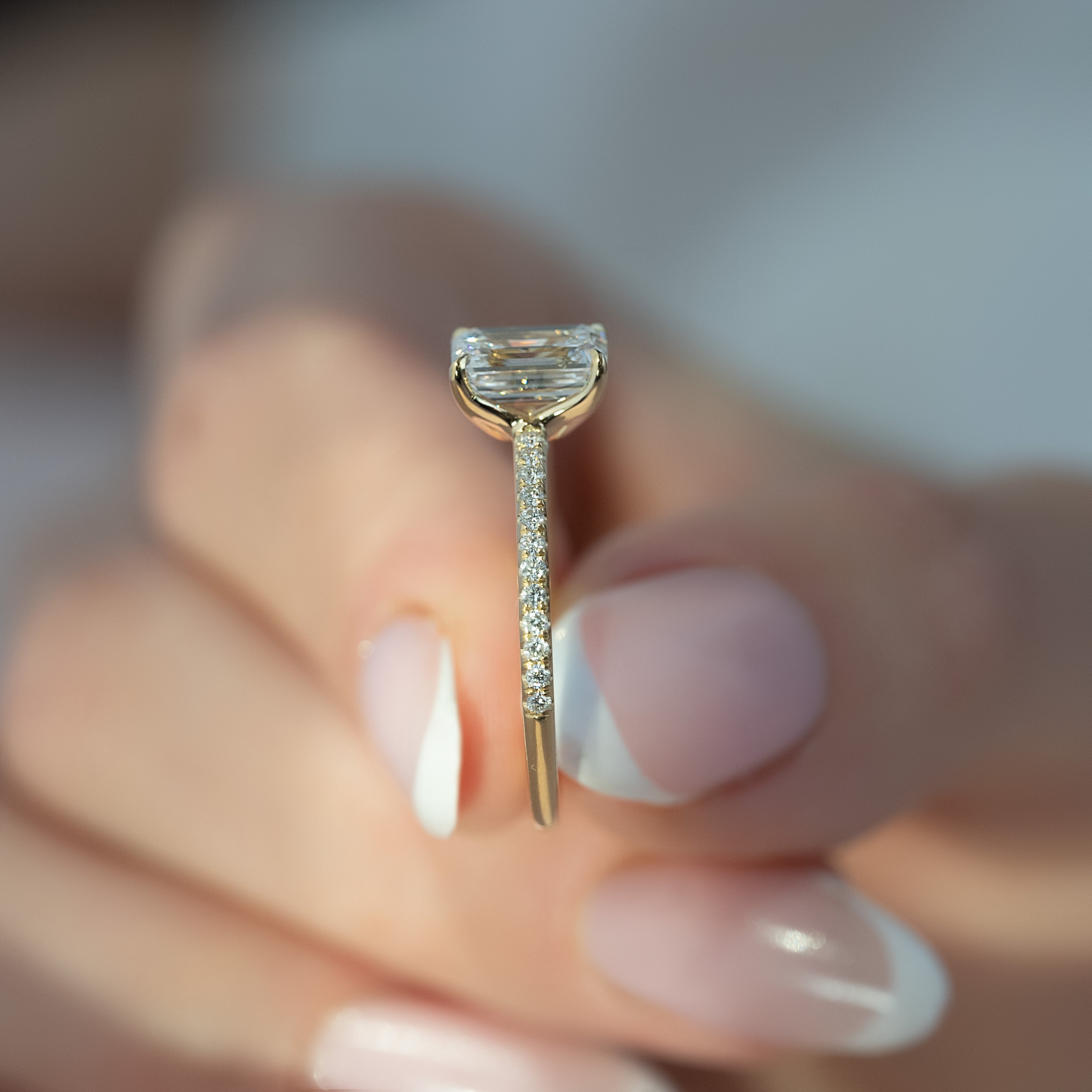 Emerald cut CVD diamond pave setting engagement ring in white gold