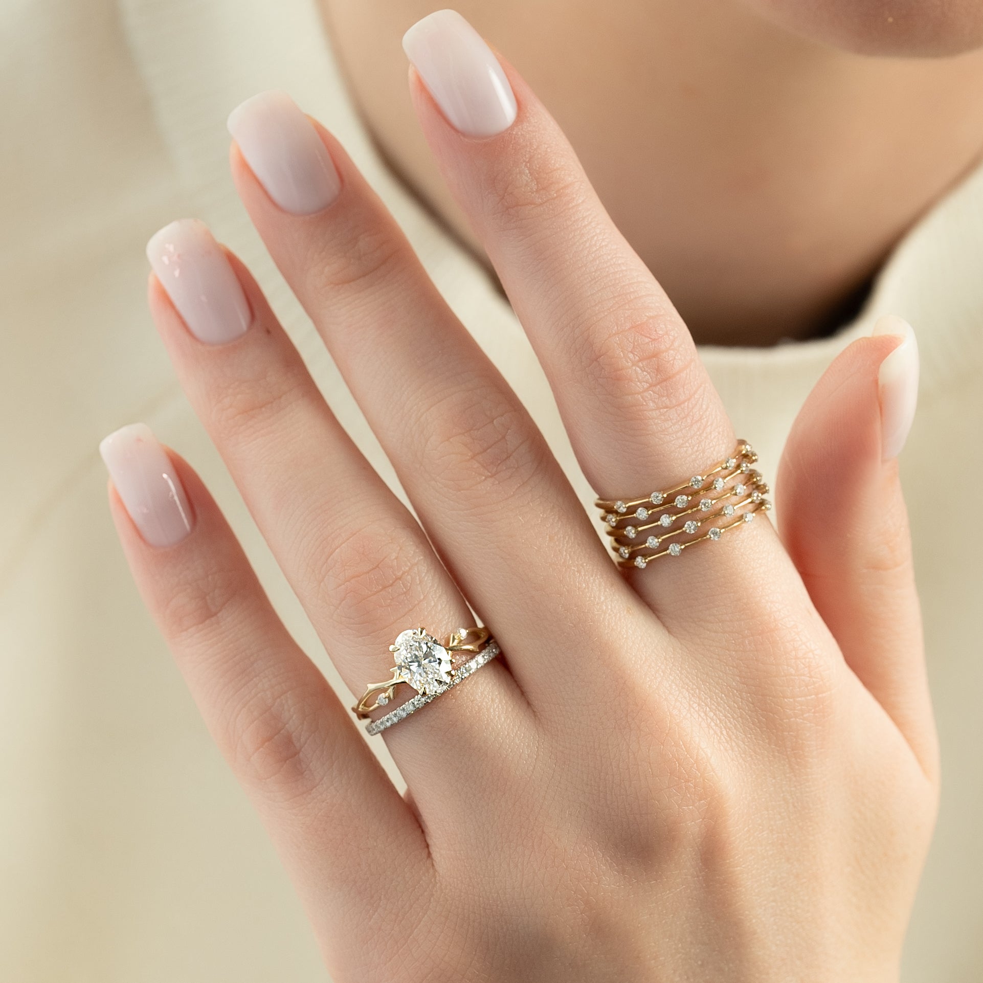 Oval cut CVD diamond engagement ring with twig-style band in white gold