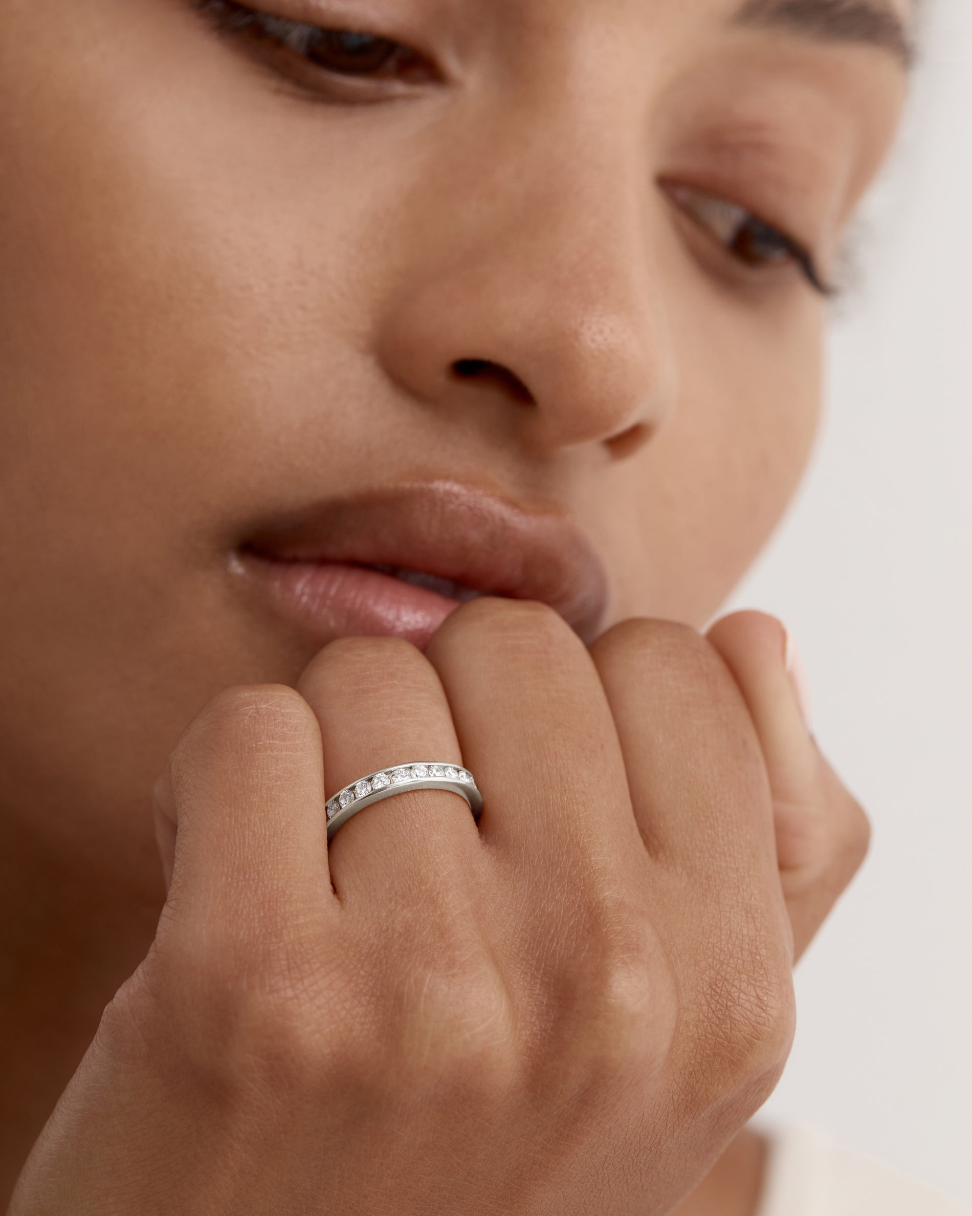 0.70 TCW Round Diamond Channel Wedding Band
