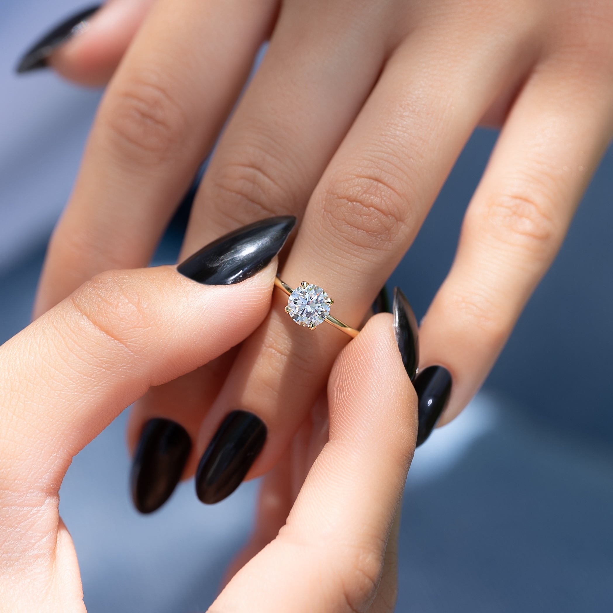 Round cut CVD diamond solitaire engagement ring in white gold setting