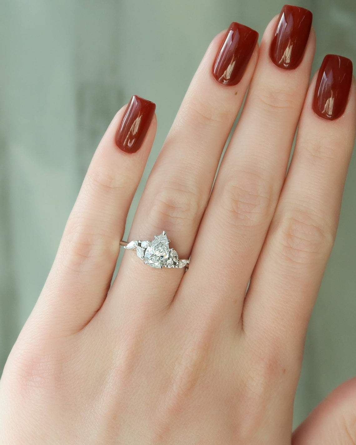 Pear cut CVD diamond cluster engagement ring in platinum setting