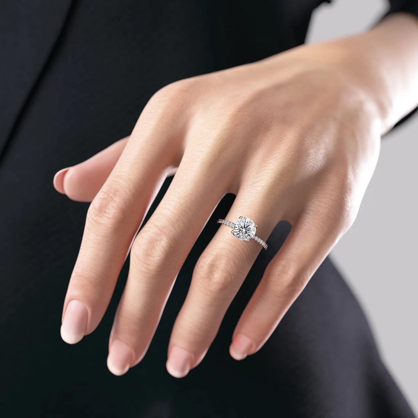 Round cut CVD diamond engagement ring with delicate pave diamond band in platinum