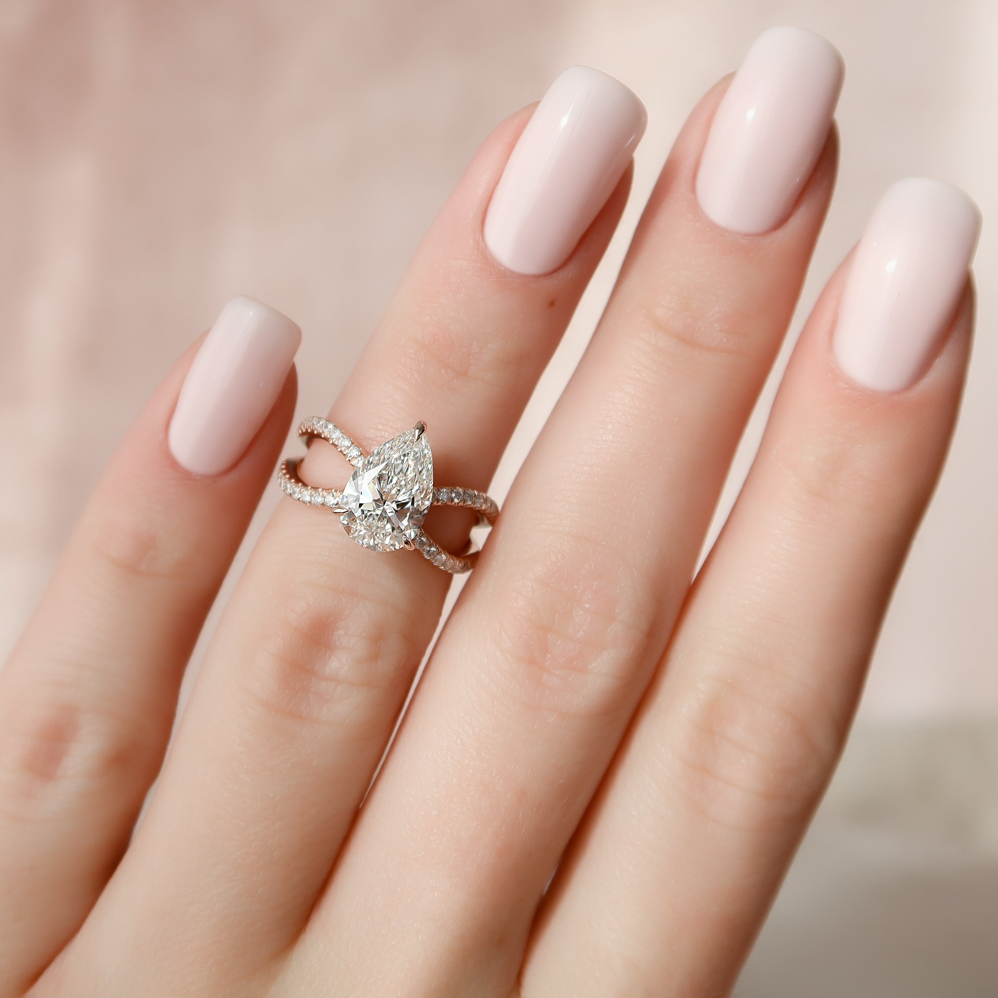 2.0 - 4.0 CT Pear Cut Lab Grown Diamond Criss Cross Engagement Ring