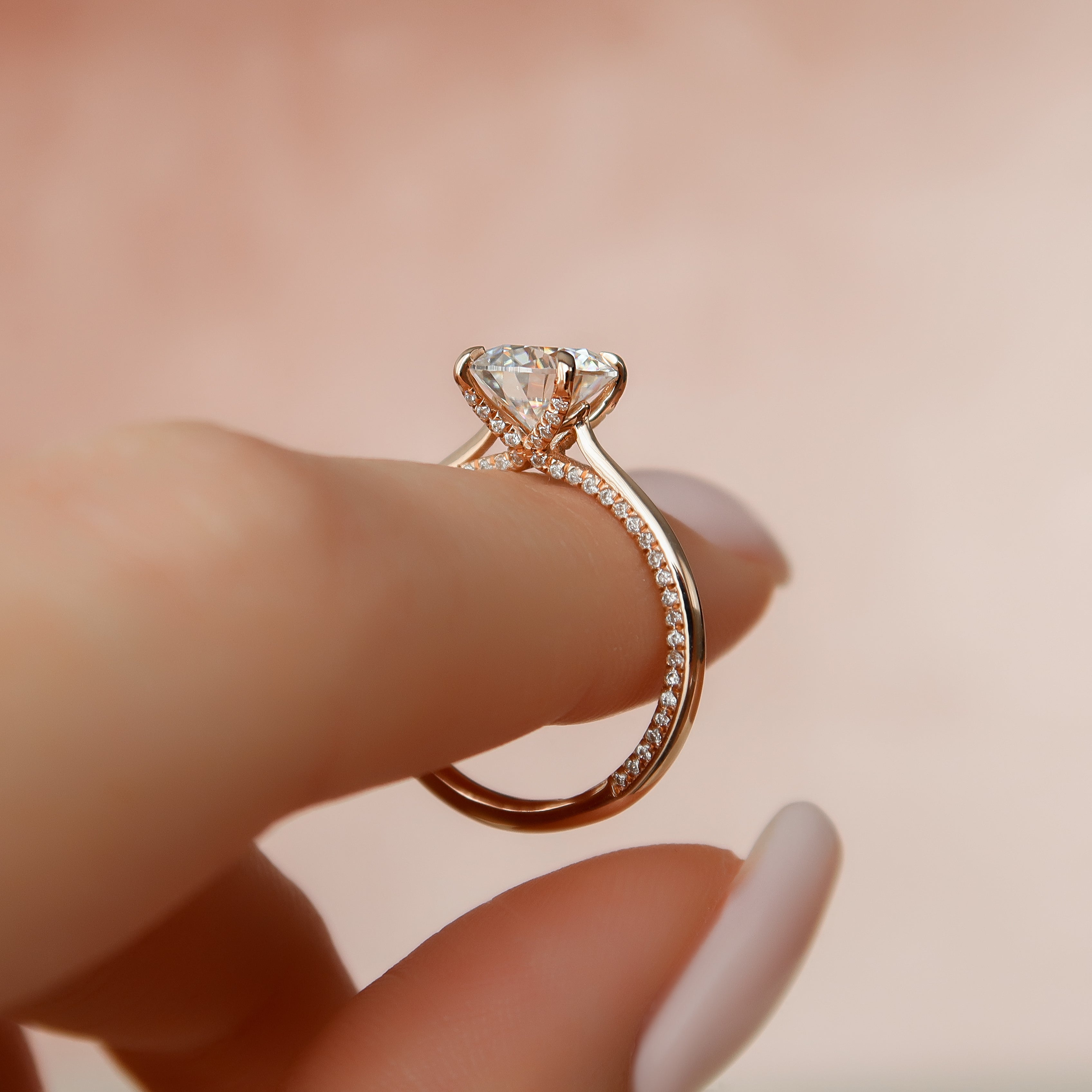 Round cut CVD diamond engagement ring with unique pave band in white gold