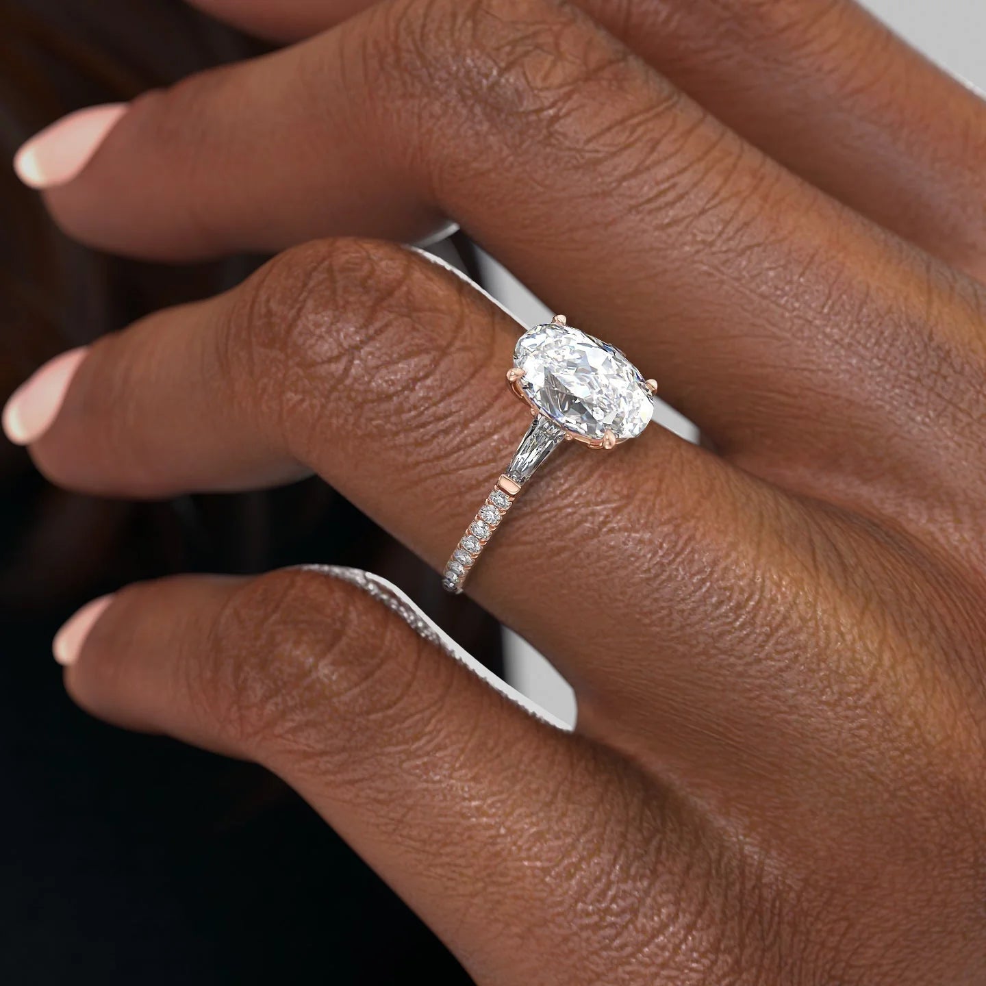 Oval cut CVD diamond three stone engagement ring with side stones in white gold