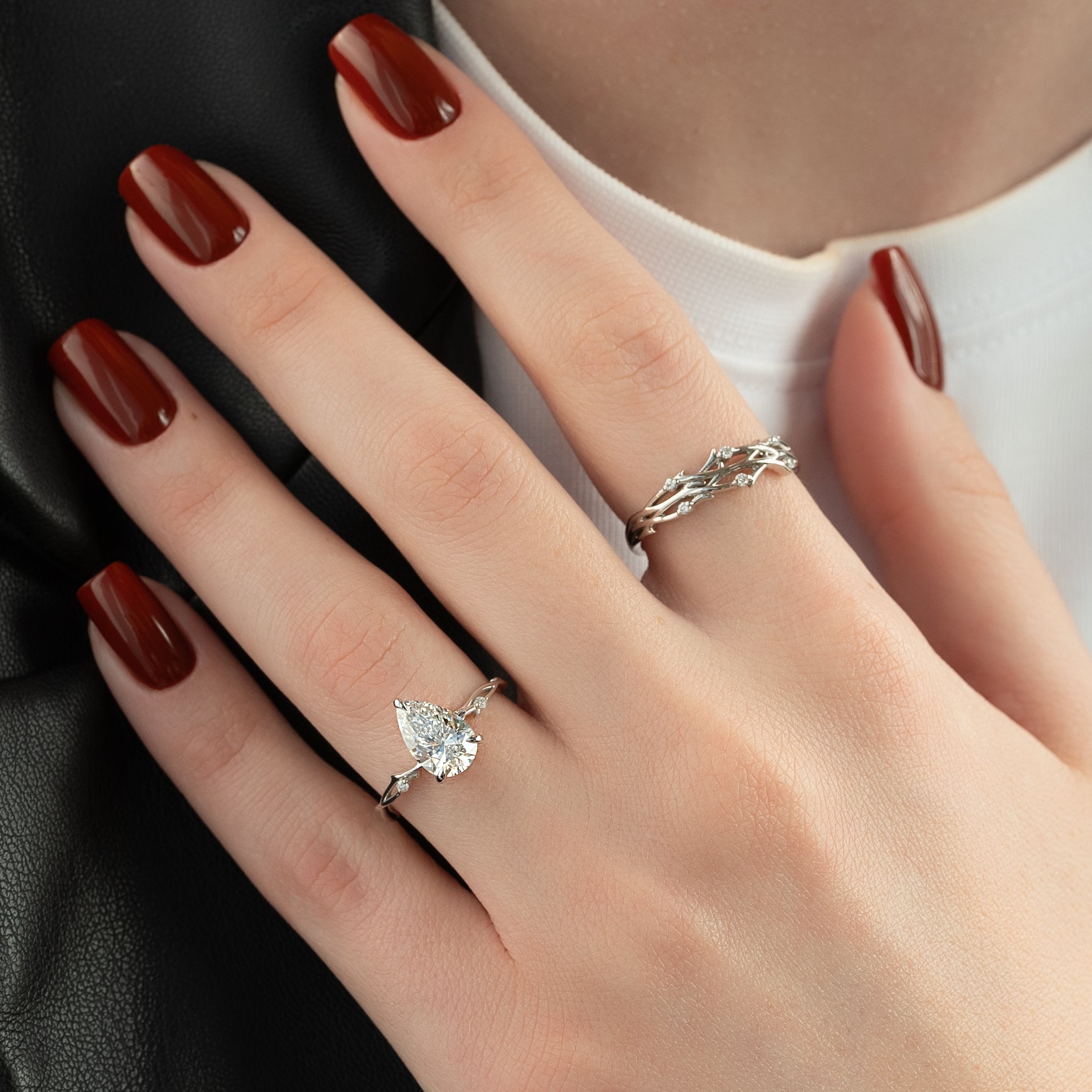 Pear cut CVD diamond engagement ring in twig-style band with organic detailing
