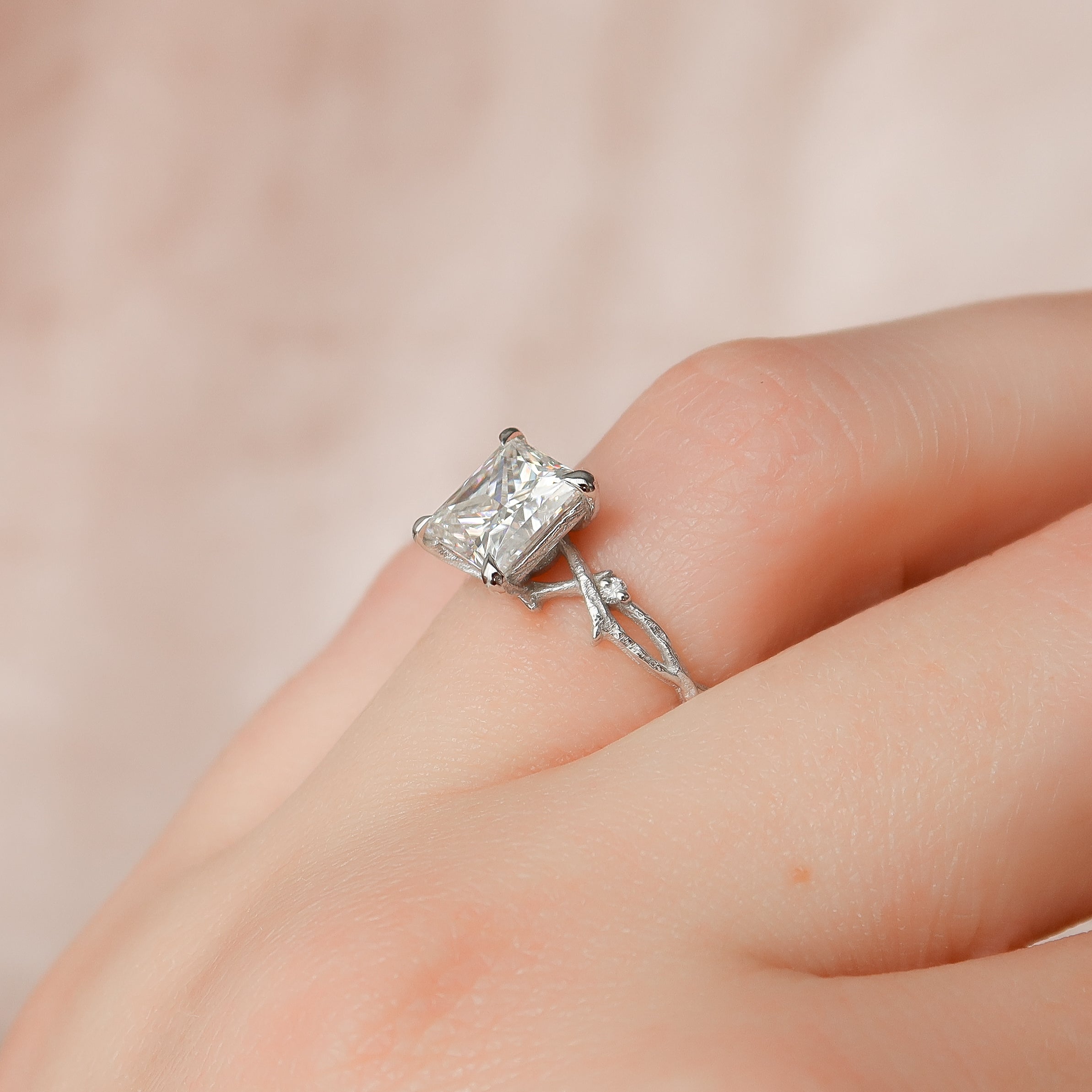 Princess cut CVD diamond engagement ring with twig-style band in white gold