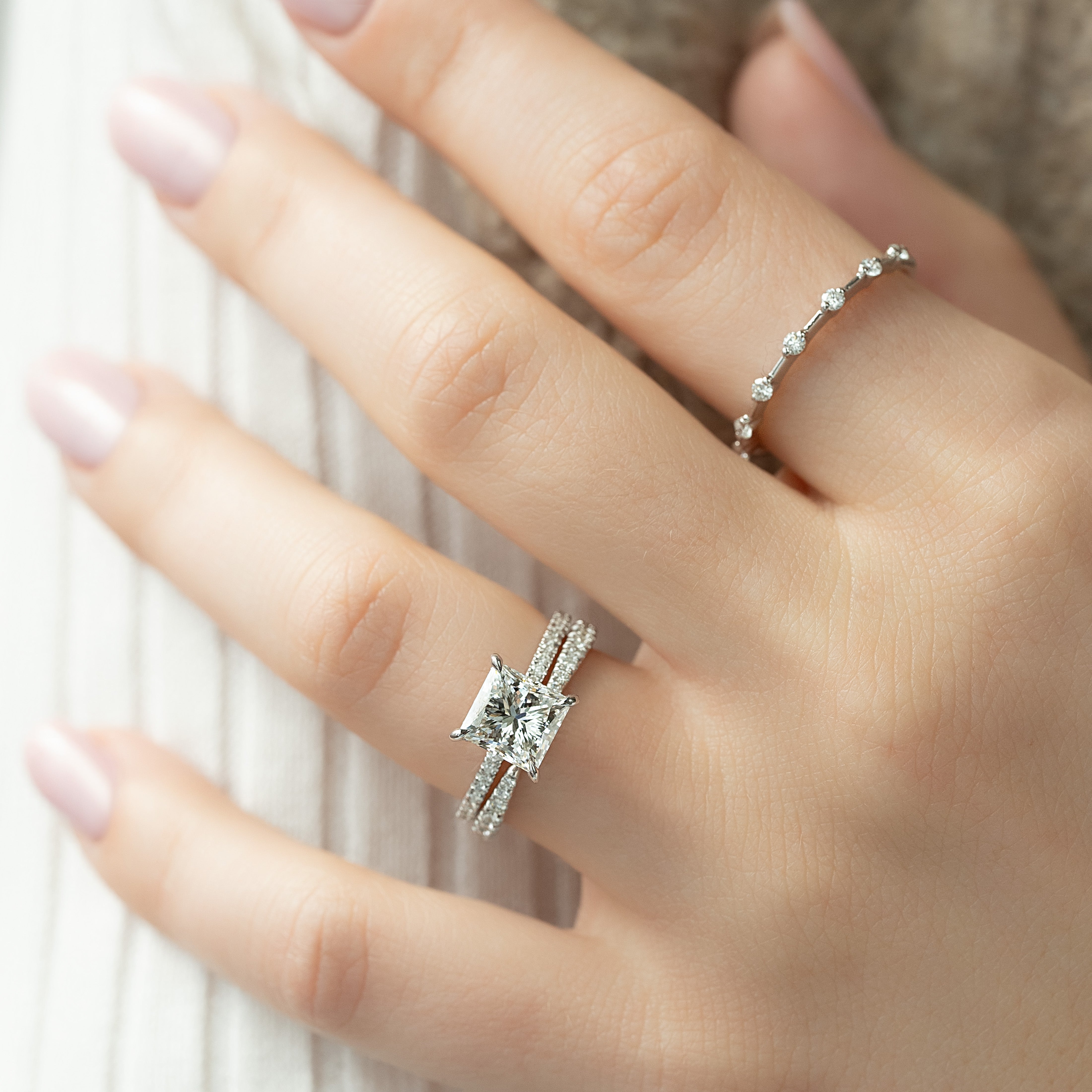 Princess cut CVD diamond engagement ring with hidden halo and pave diamond band in white gold