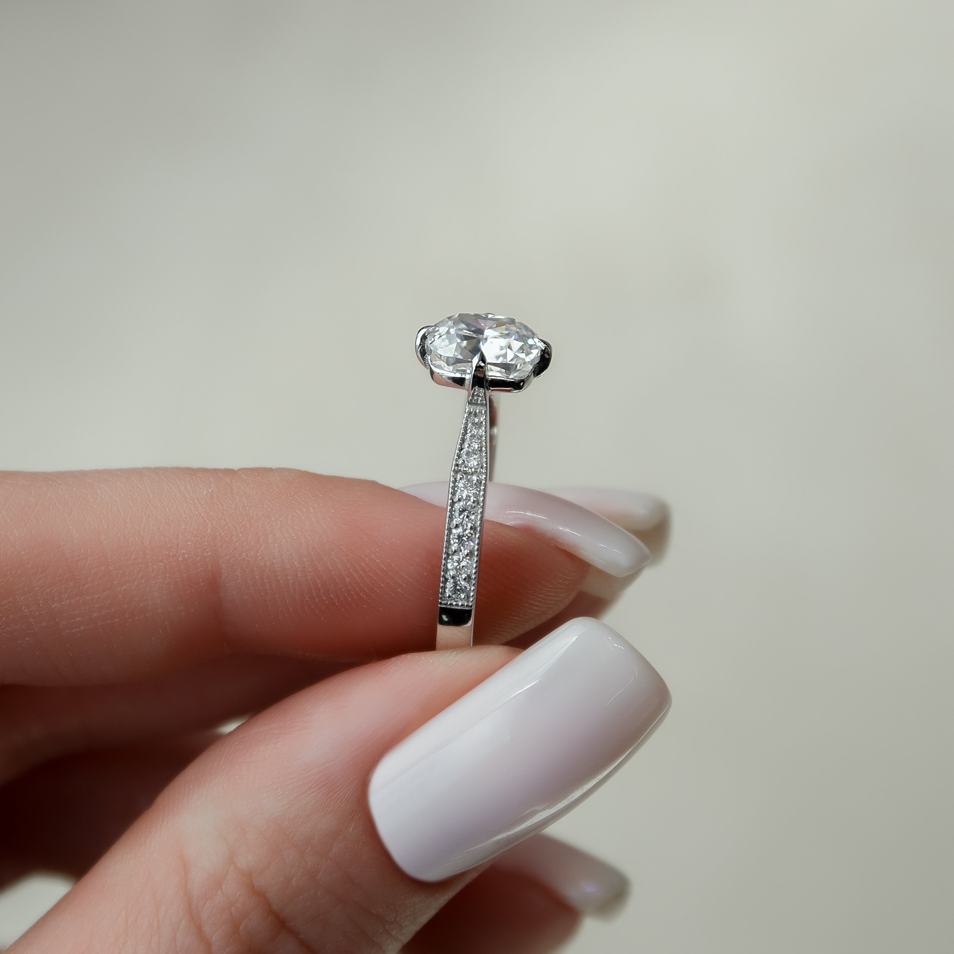 Cushion cut CVD diamond pave engagement ring with diamond-accented band in white gold