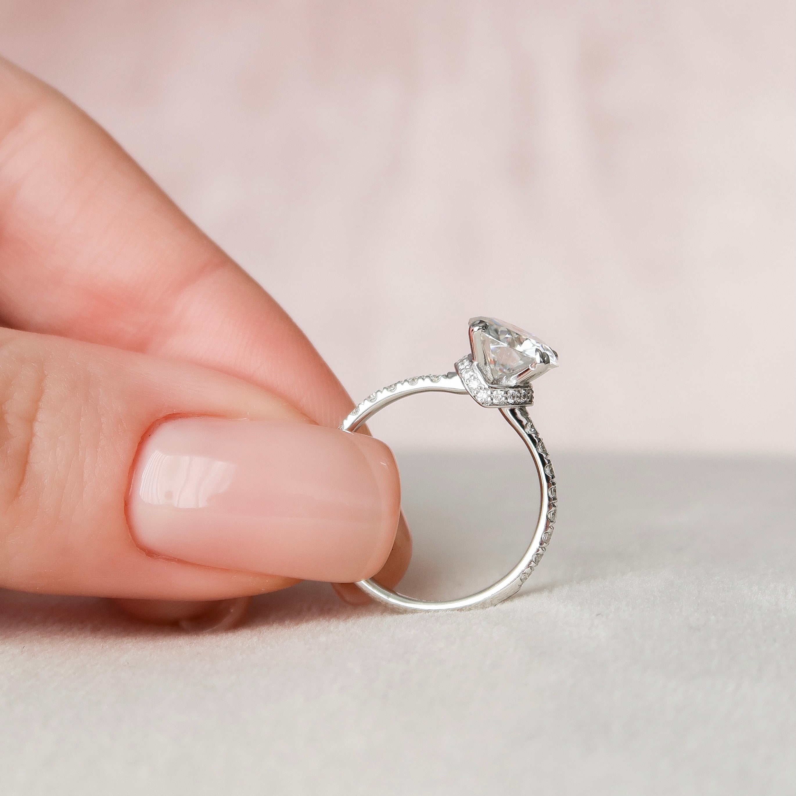 Round cut CVD diamond hidden halo engagement ring with pave band in white gold