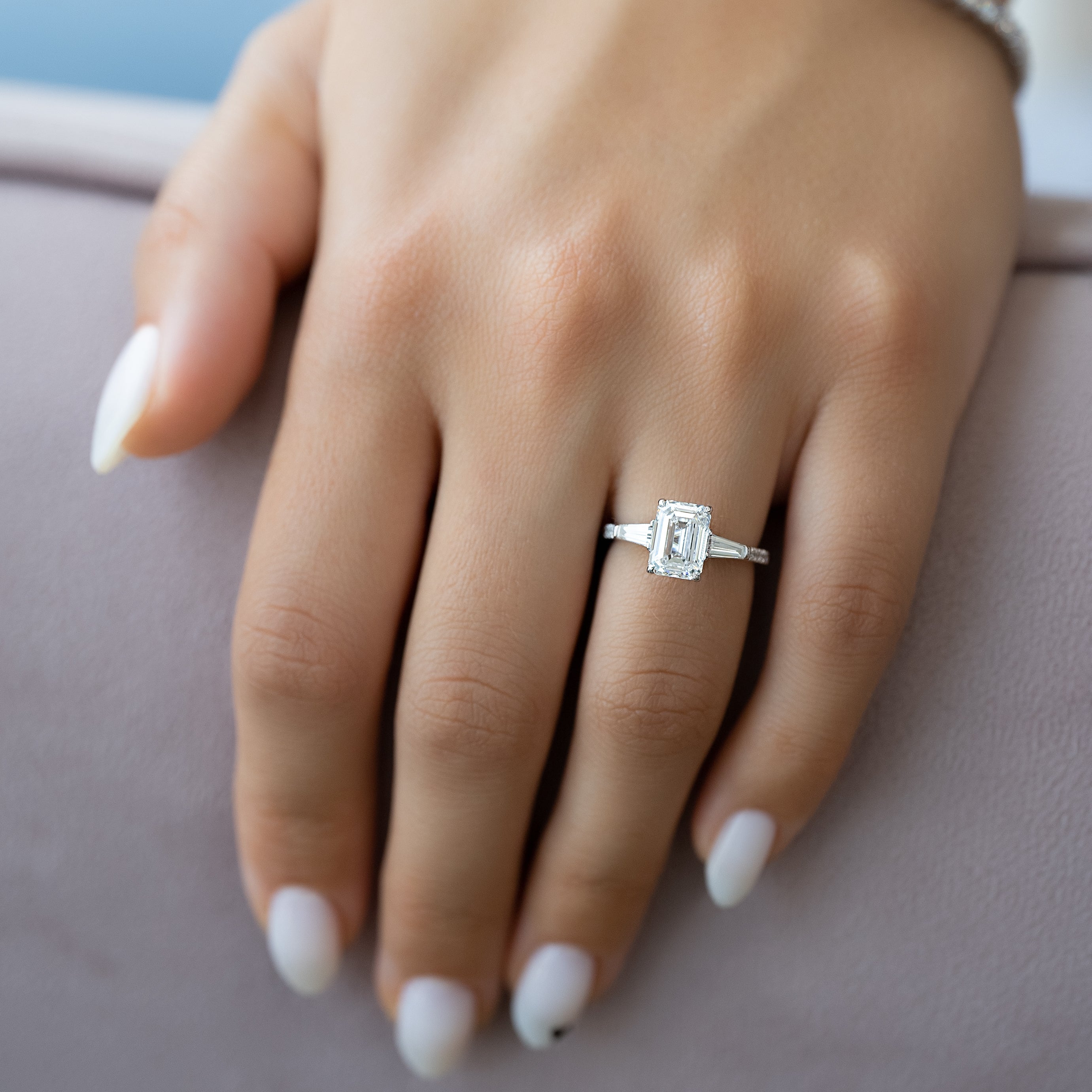 Emerald cut CVD diamond engagement ring with pave band in white gold