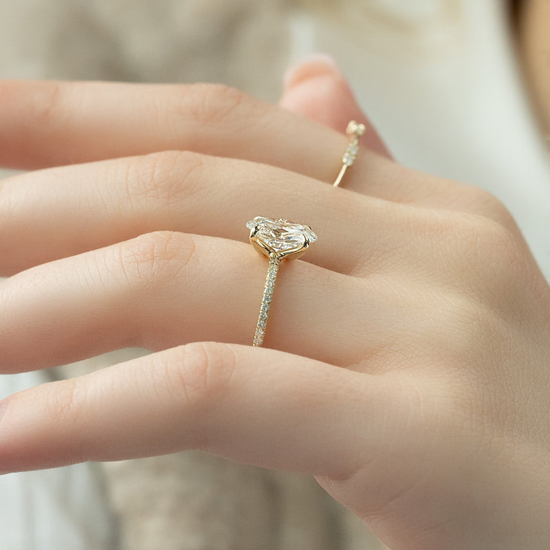 Oval cut CVD diamond pave engagement ring with slim diamond band in white gold