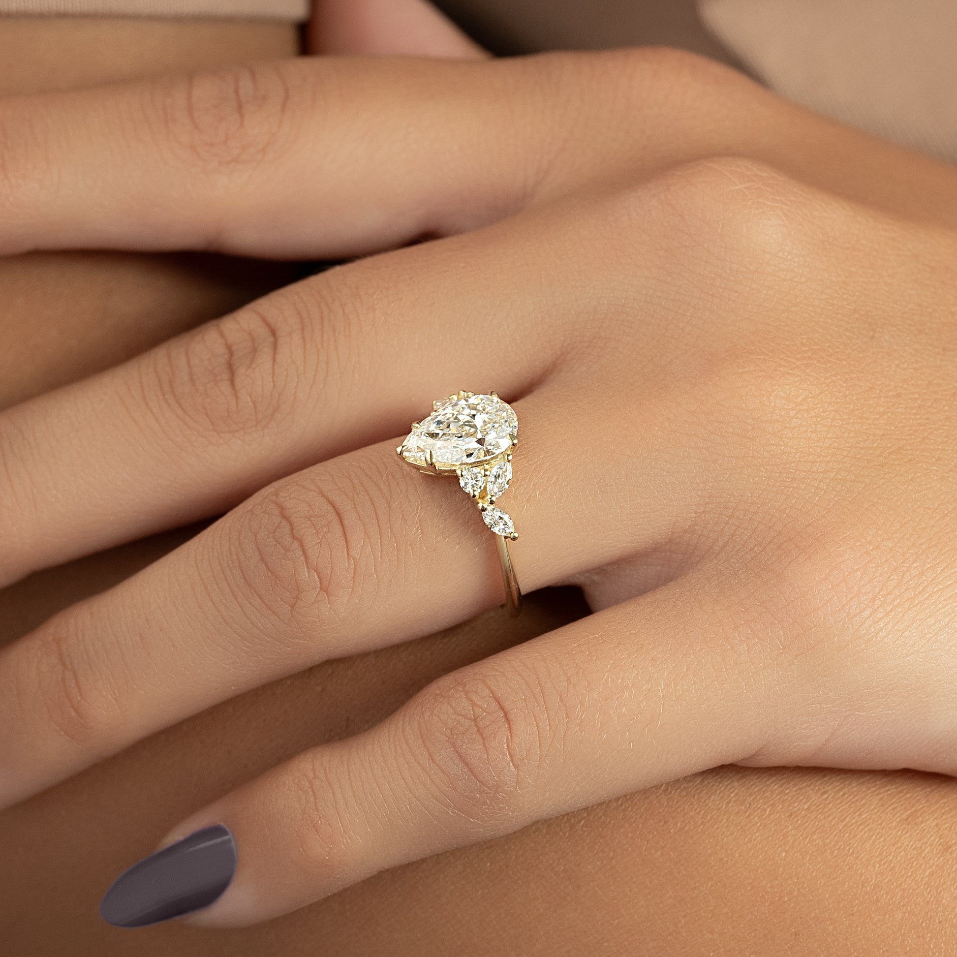 Pear cut CVD diamond cluster engagement ring in platinum setting