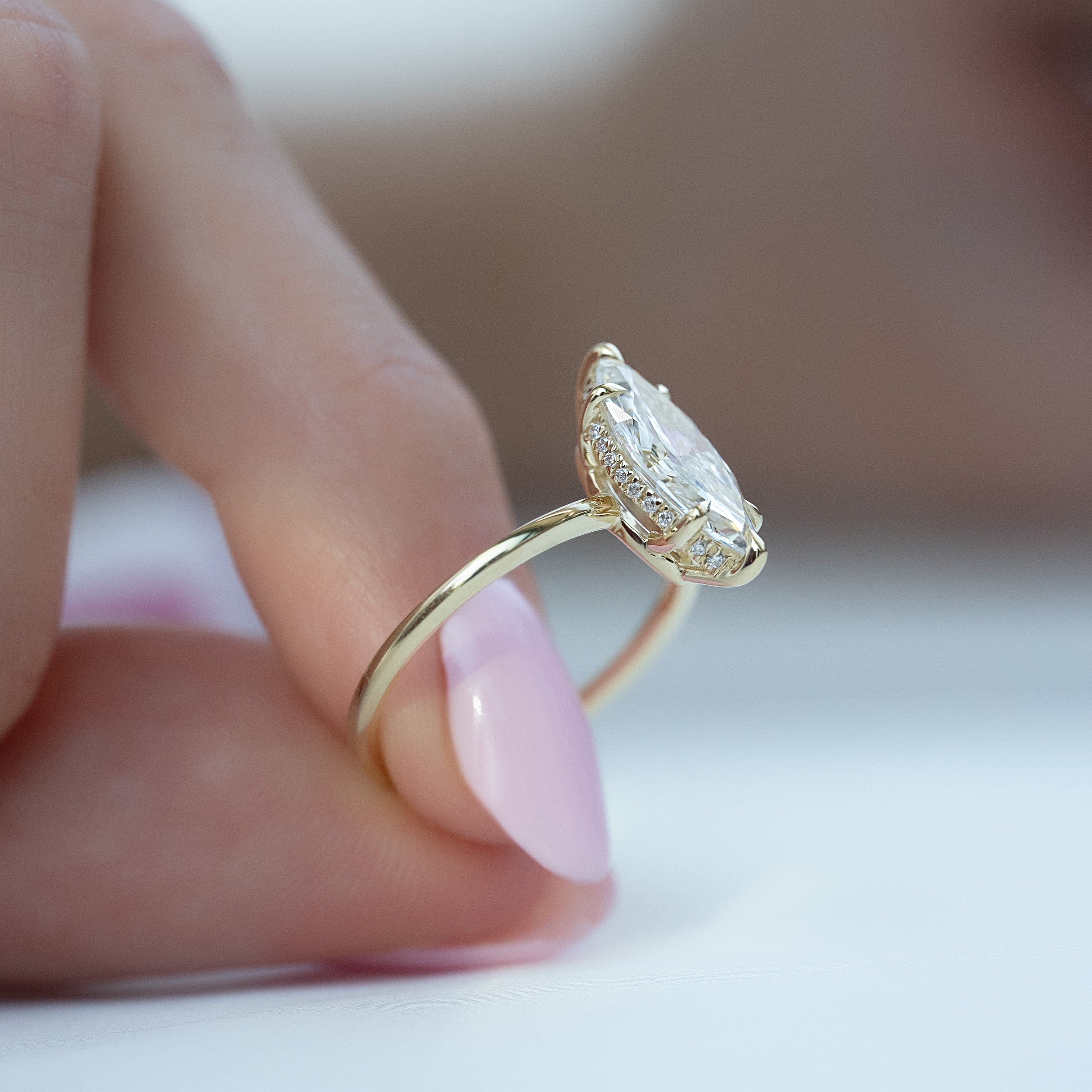 Marquise cut moissanite engagement ring with hidden halo in platinum setting, 2.0-4.0 CT