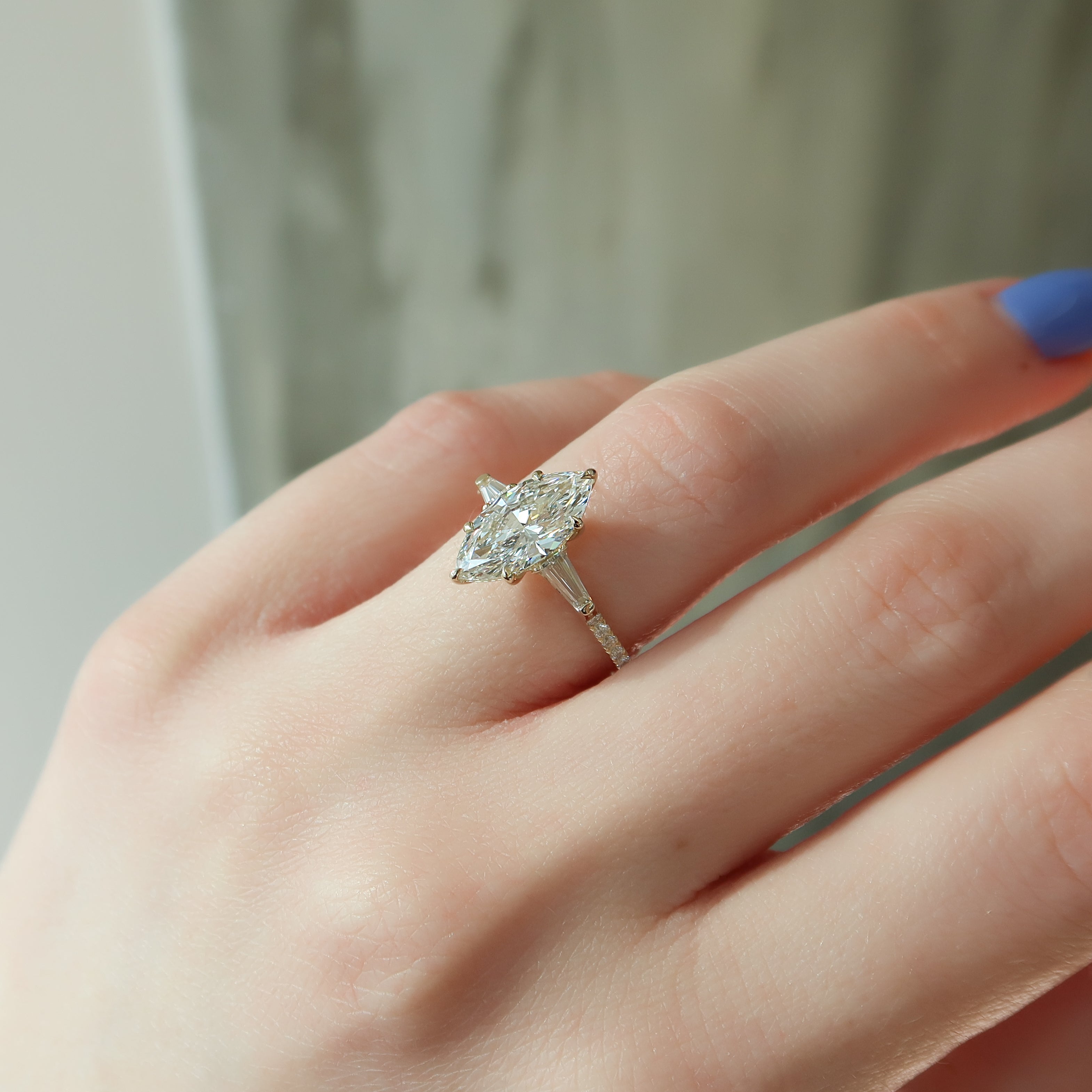 Marquise cut CVD diamond three stone engagement ring with pave band in white gold