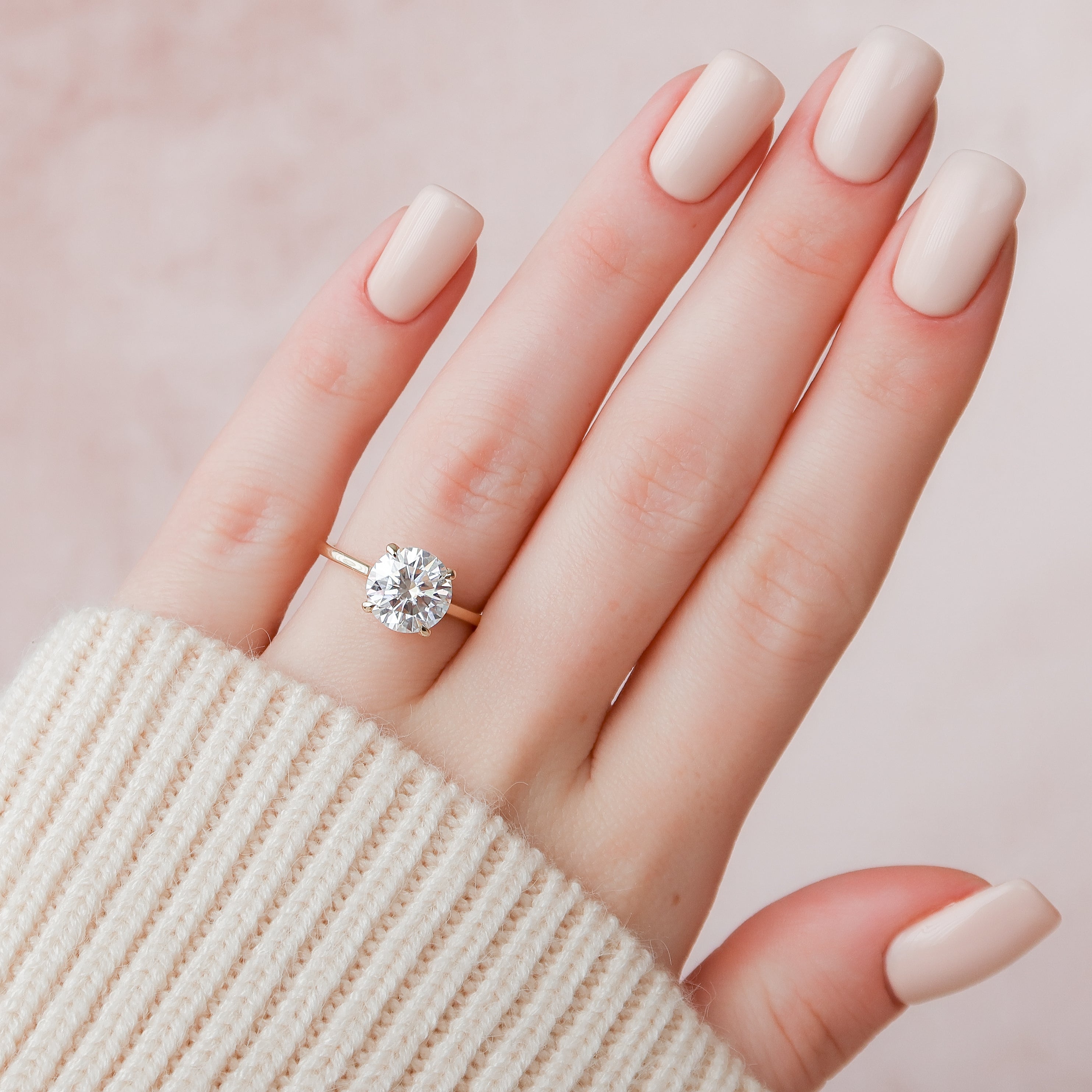 Round cut CVD diamond hidden halo engagement ring in white gold setting